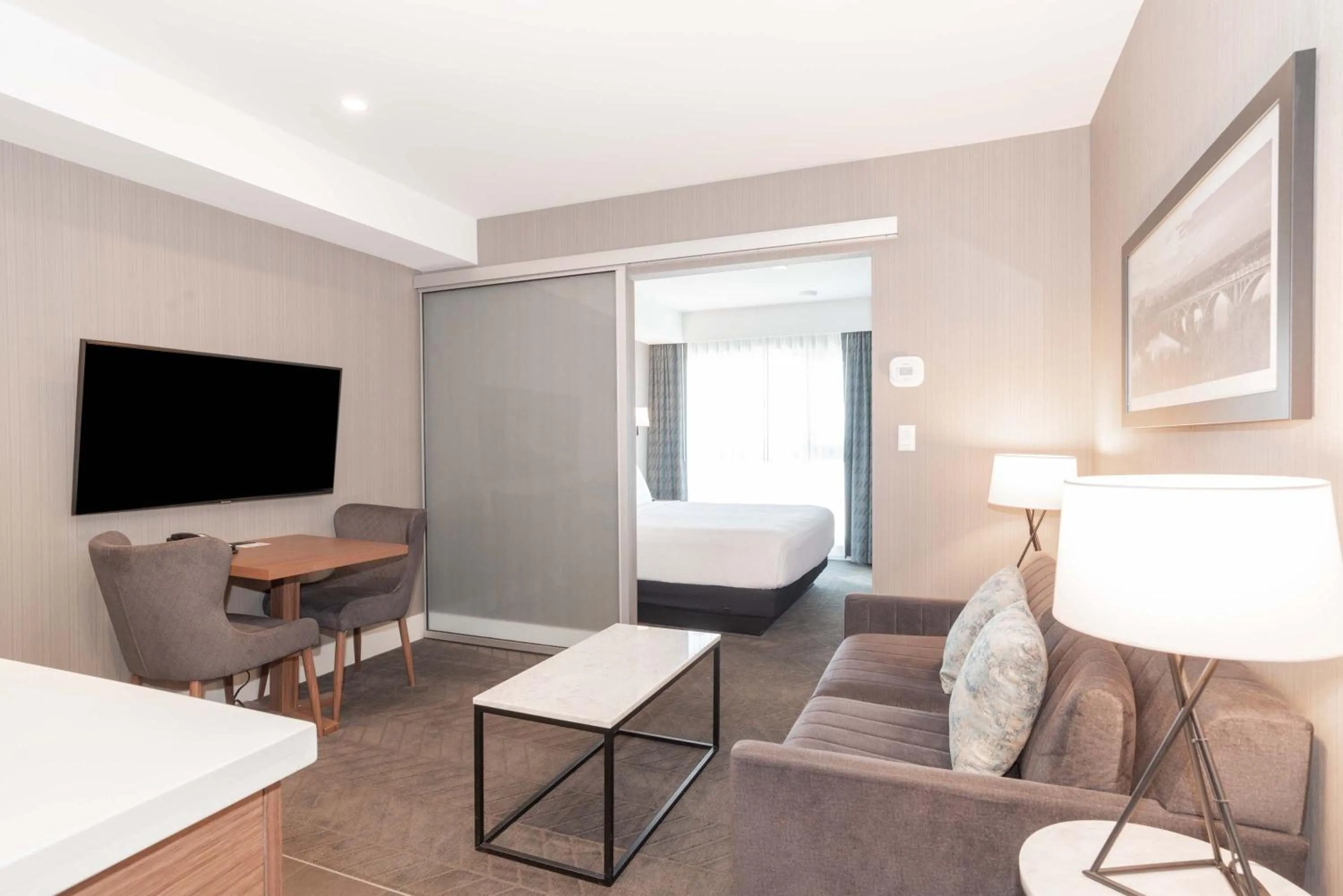 Living room in Sandman Signature Saskatoon South Hotel