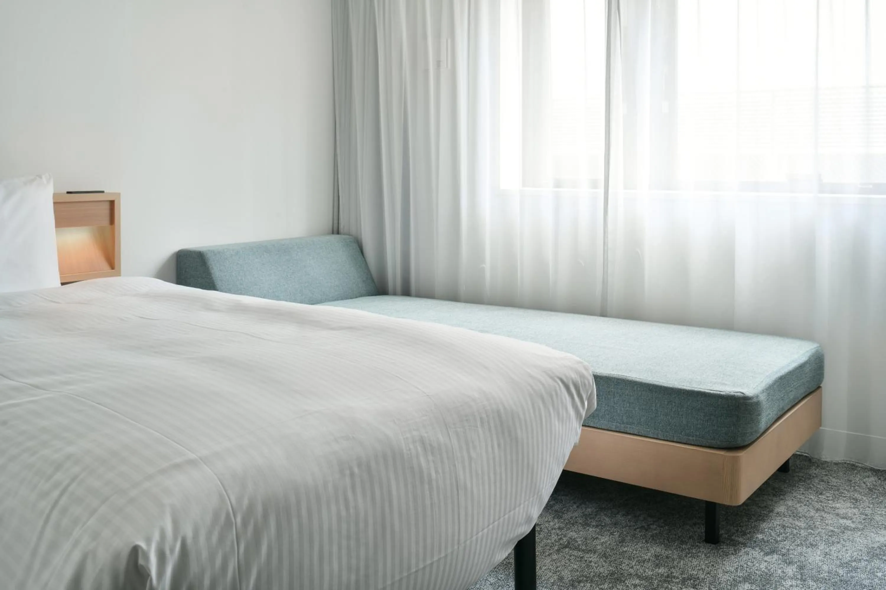 Bed in REF Omiya by VESSEL HOTELS