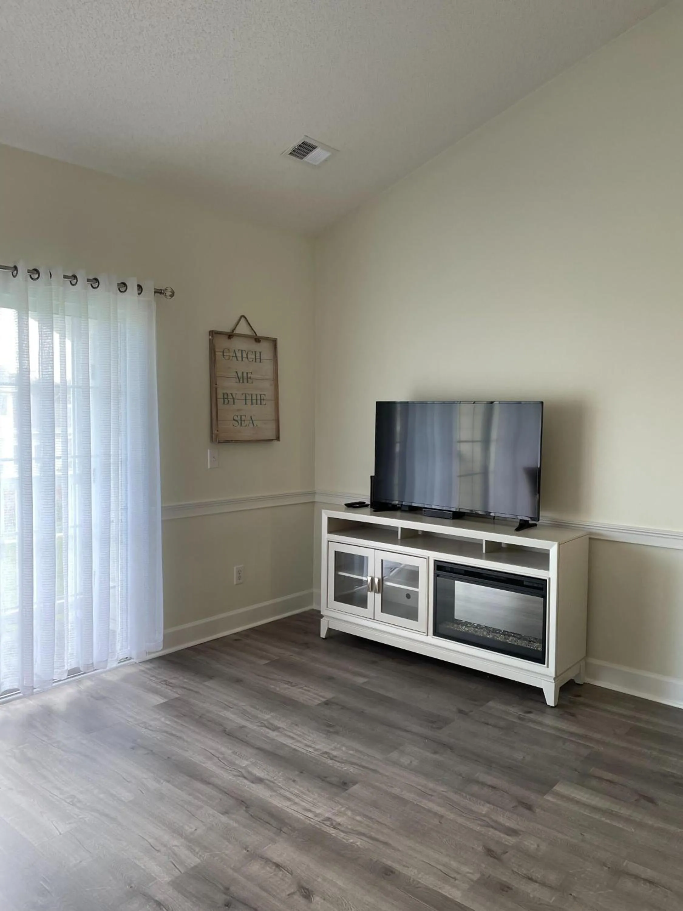 Living room in Magnolia Place by Palmetto Vacations