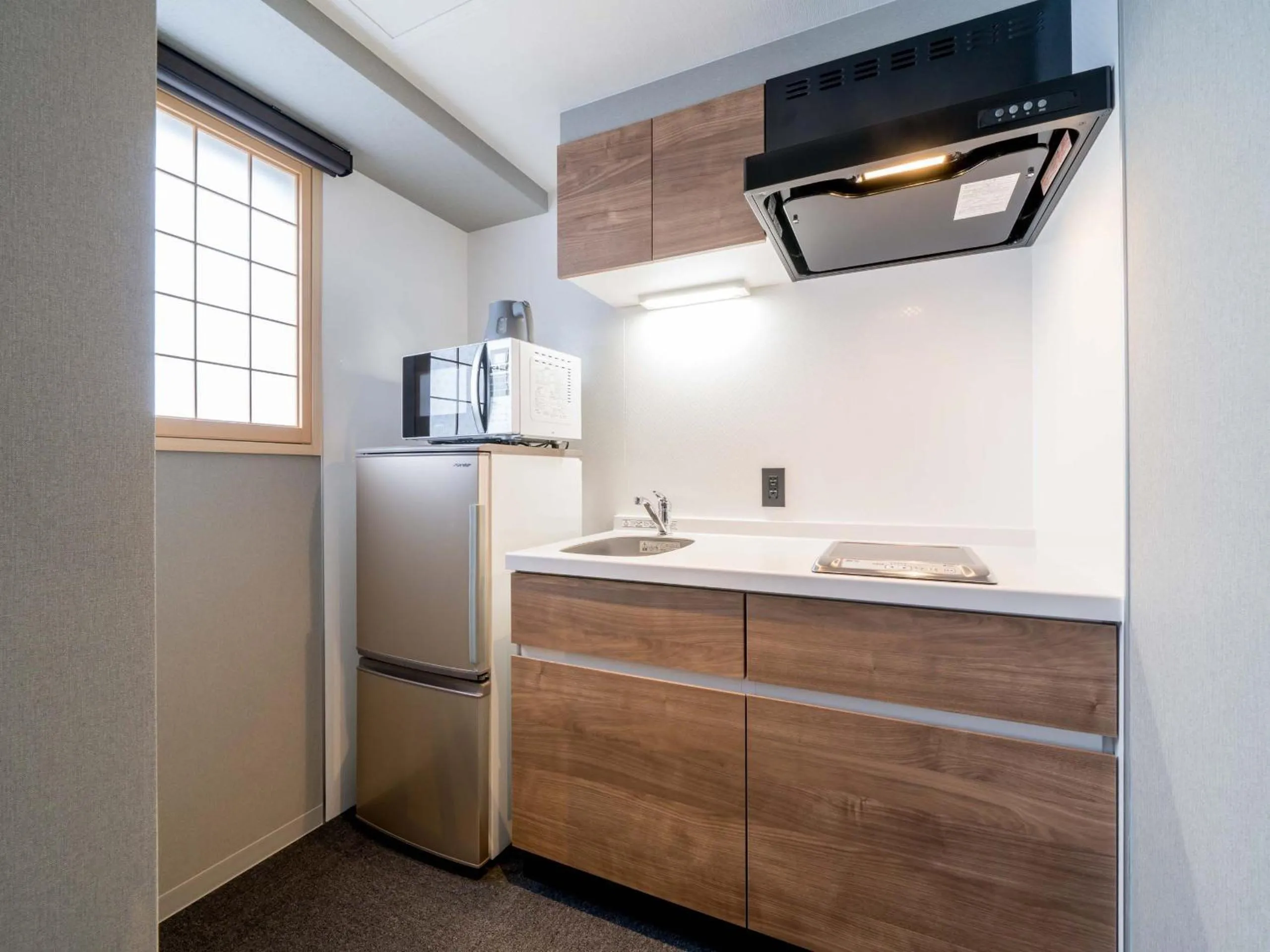 kitchen in RESI STAY Hotel Sun Chlorella