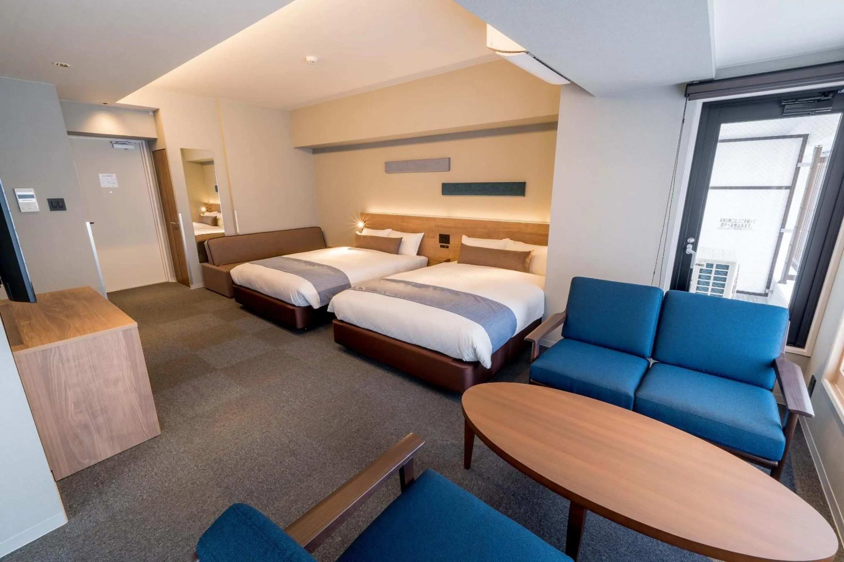 Living room, Bed in RESI STAY Hotel Sun Chlorella