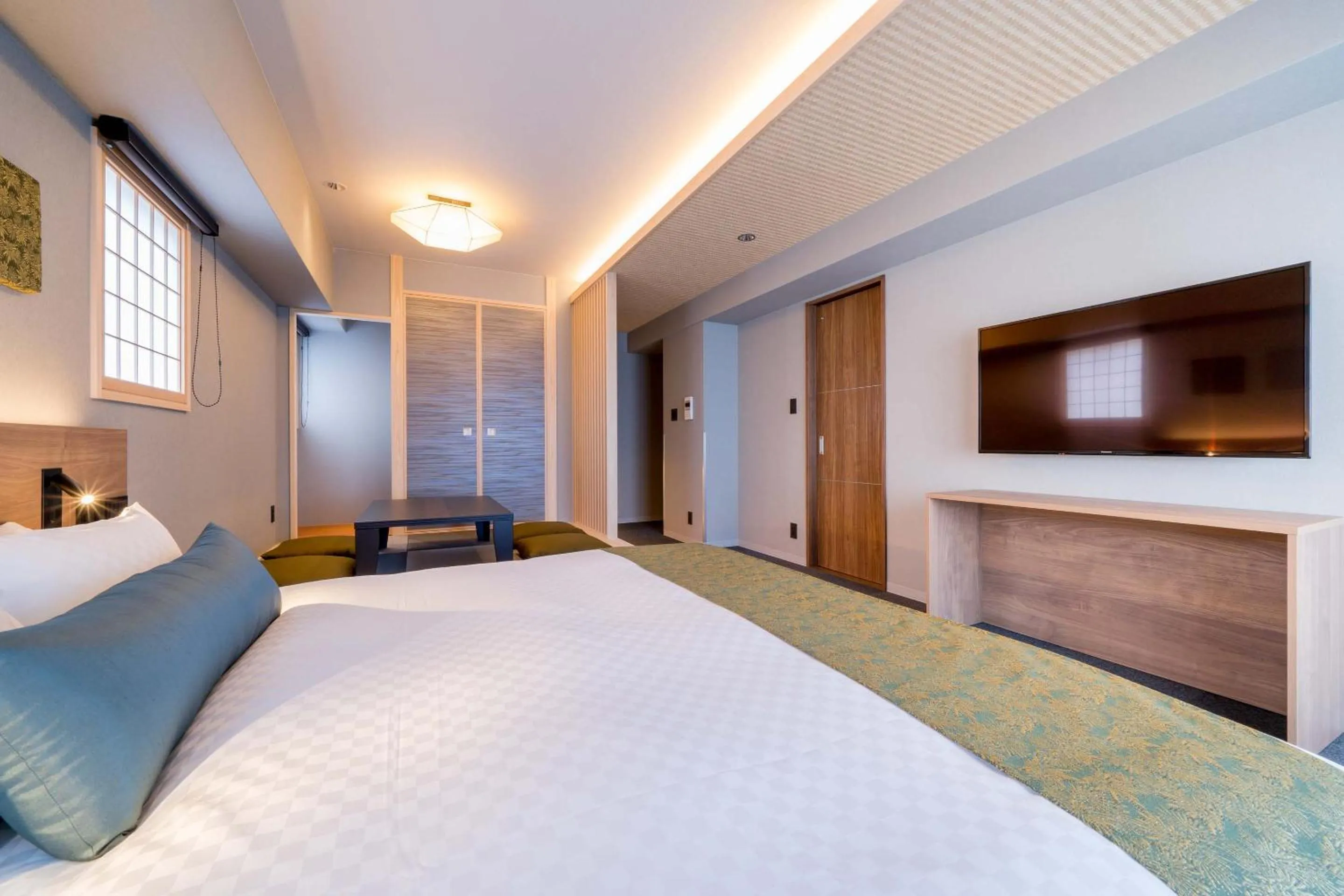 Bed in RESI STAY Hotel Sun Chlorella