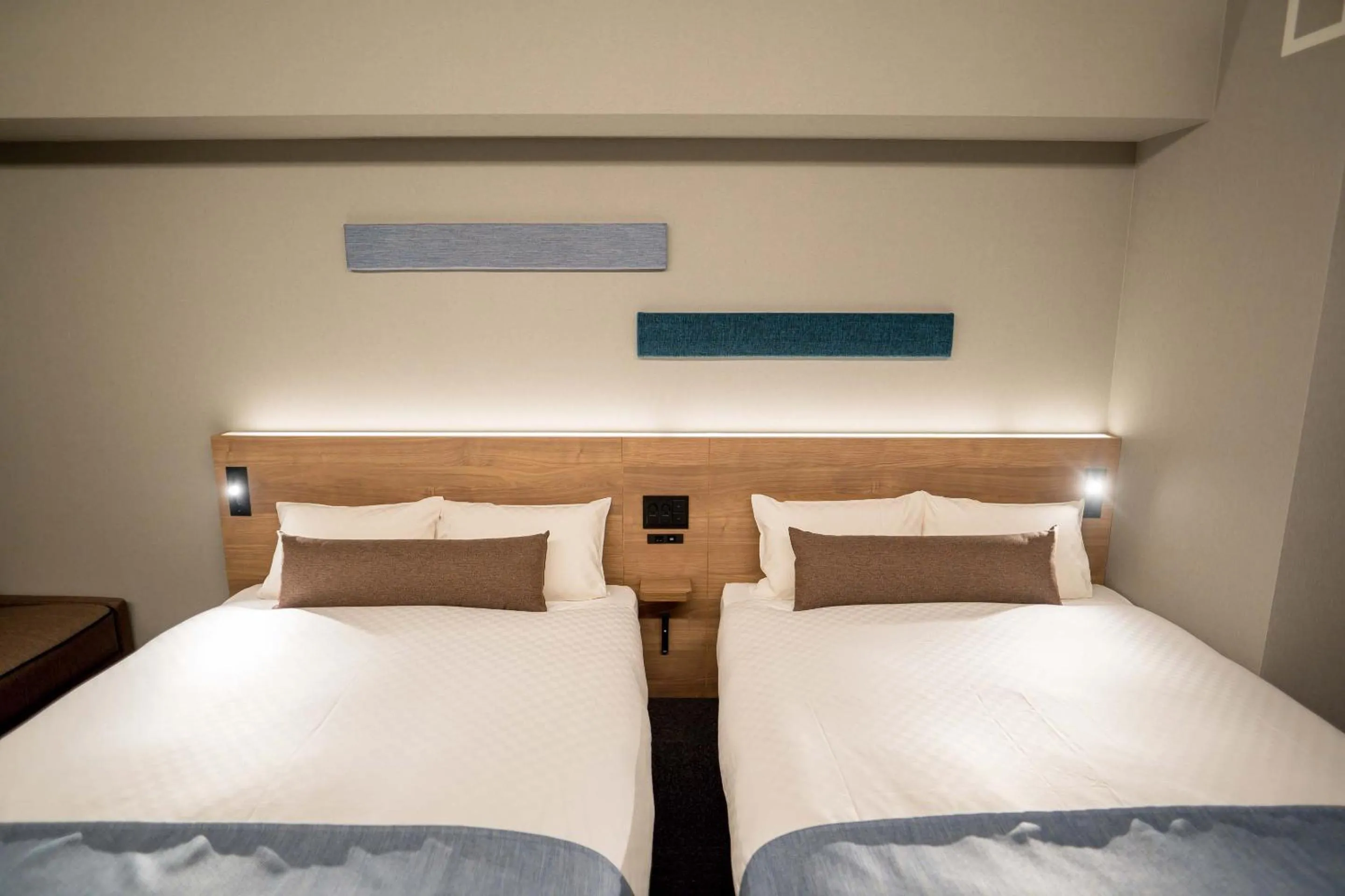 Bed in RESI STAY Hotel Sun Chlorella