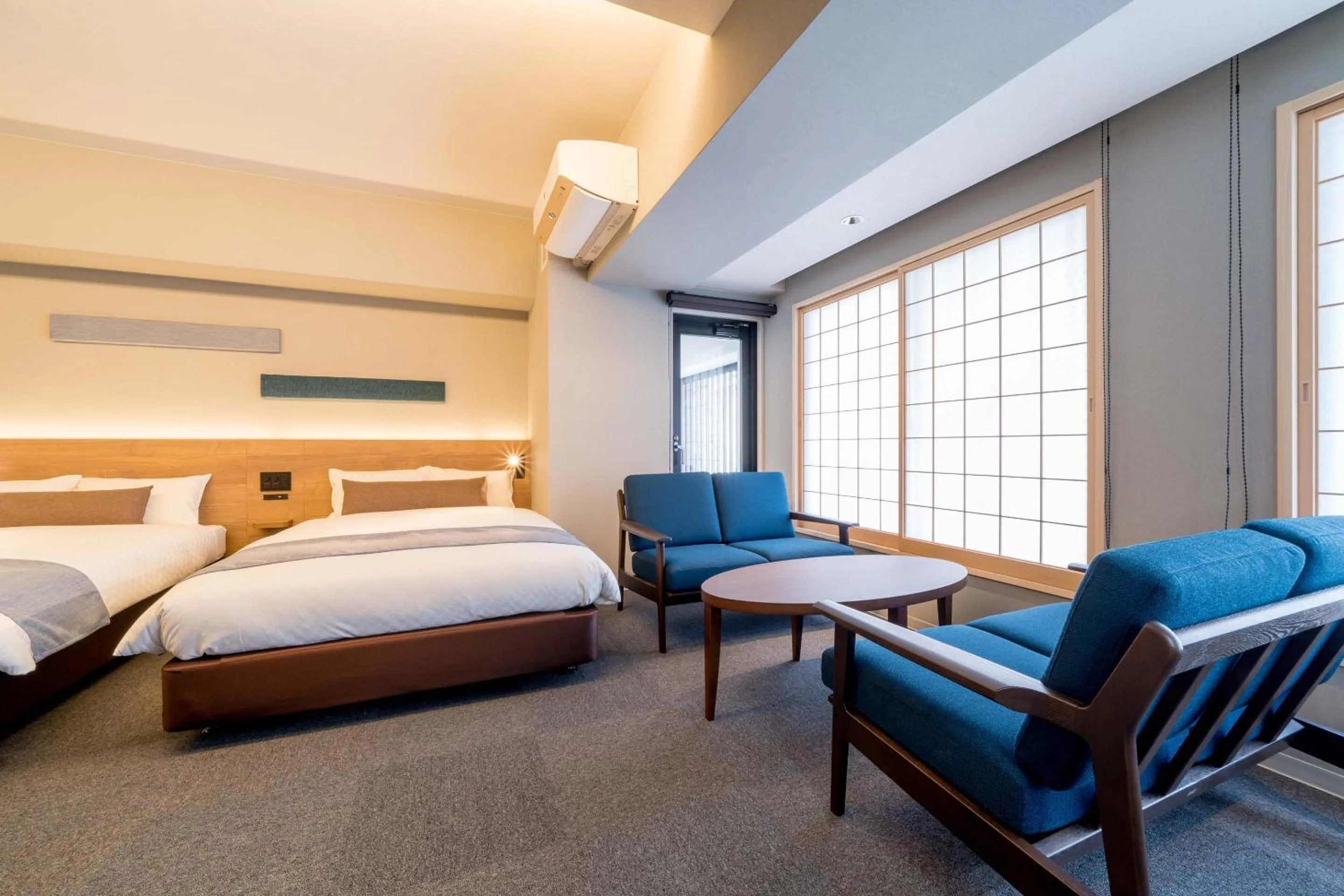 Living room, Bed in RESI STAY Hotel Sun Chlorella