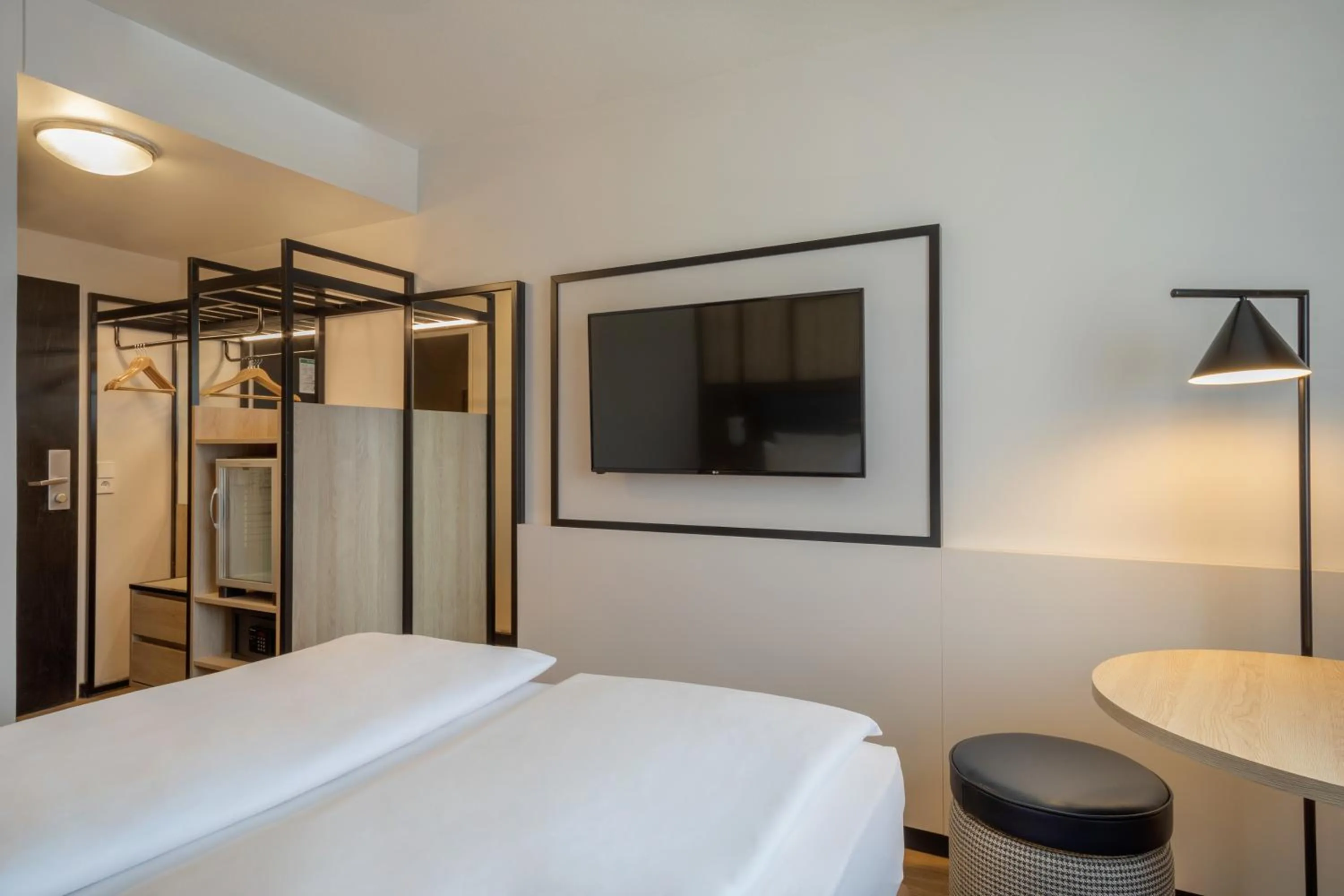 TV and multimedia, Bed in Hotel München City Center affiliated by Meliá