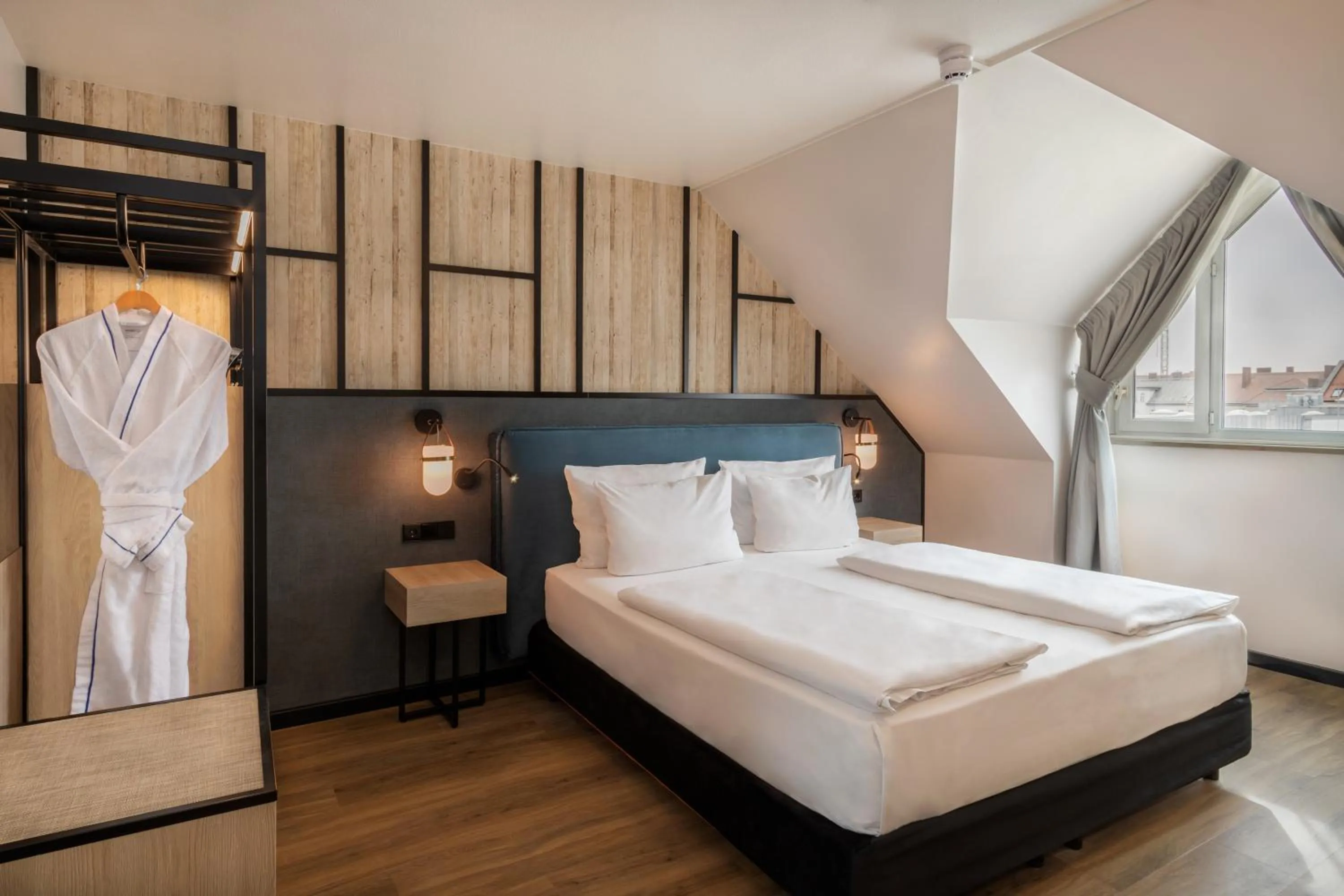 Bedroom, Bed in Hotel München City Center affiliated by Meliá