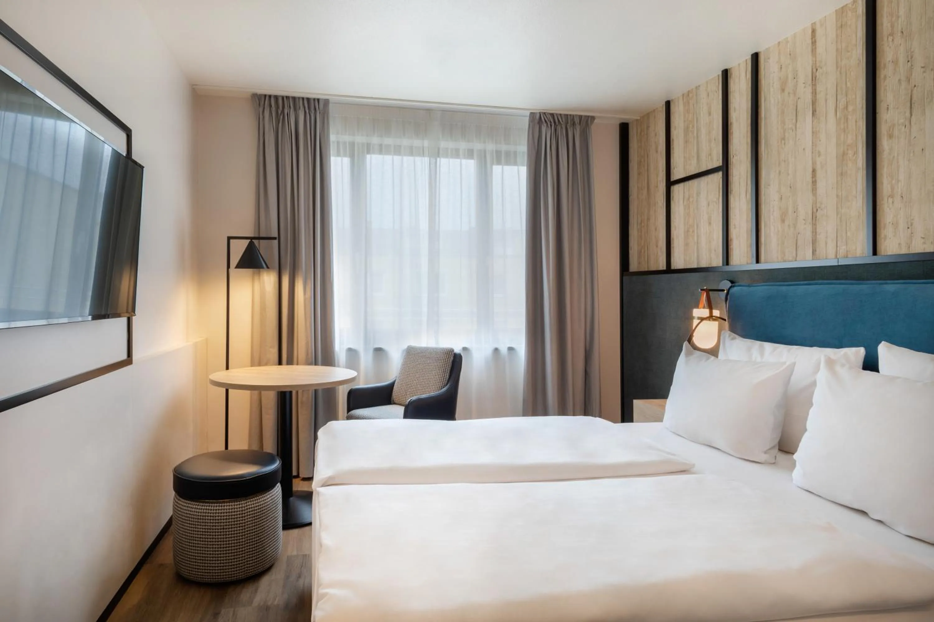 Bedroom, Bed in Hotel München City Center affiliated by Meliá