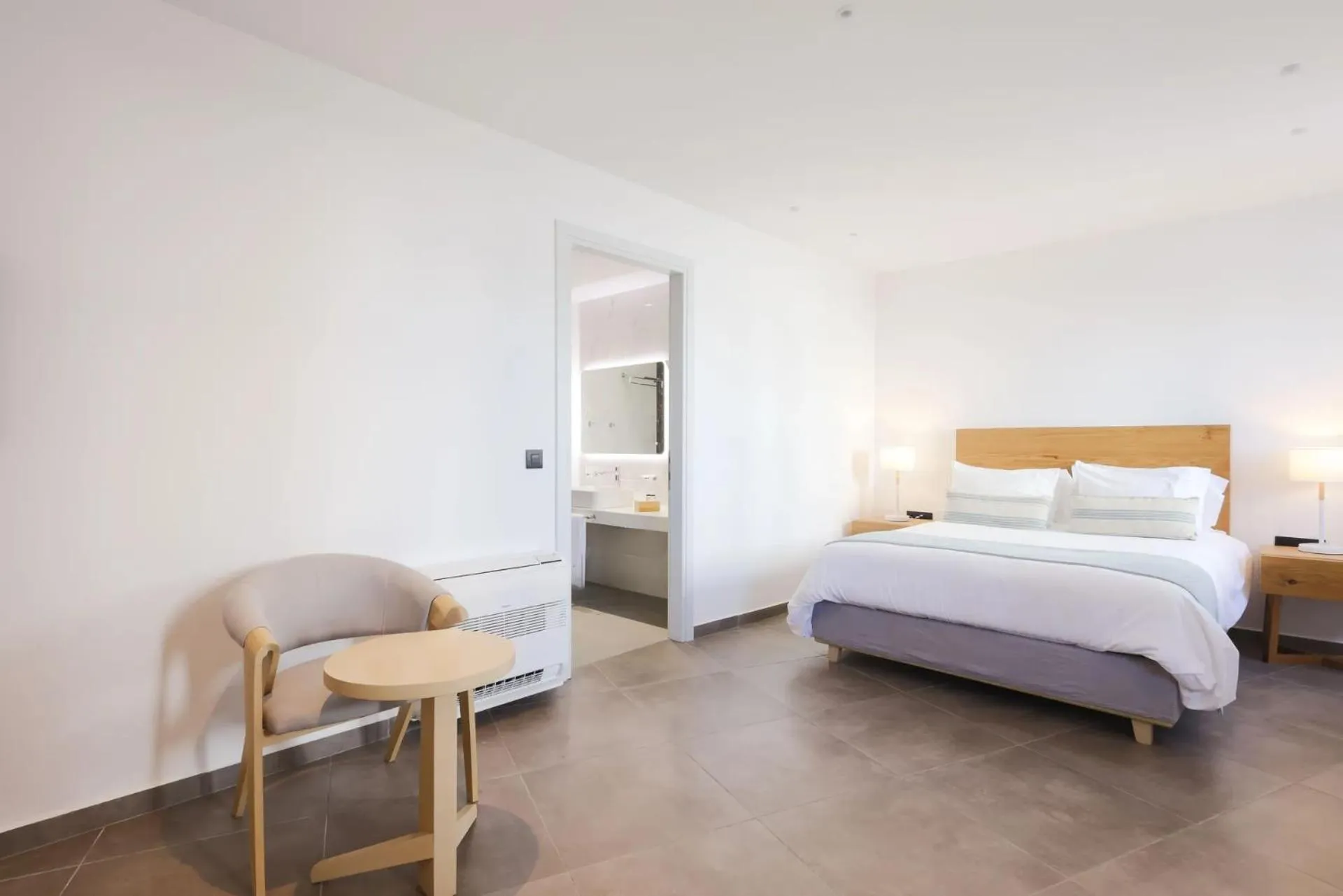 Bed in Aeifos Boutique Hotel