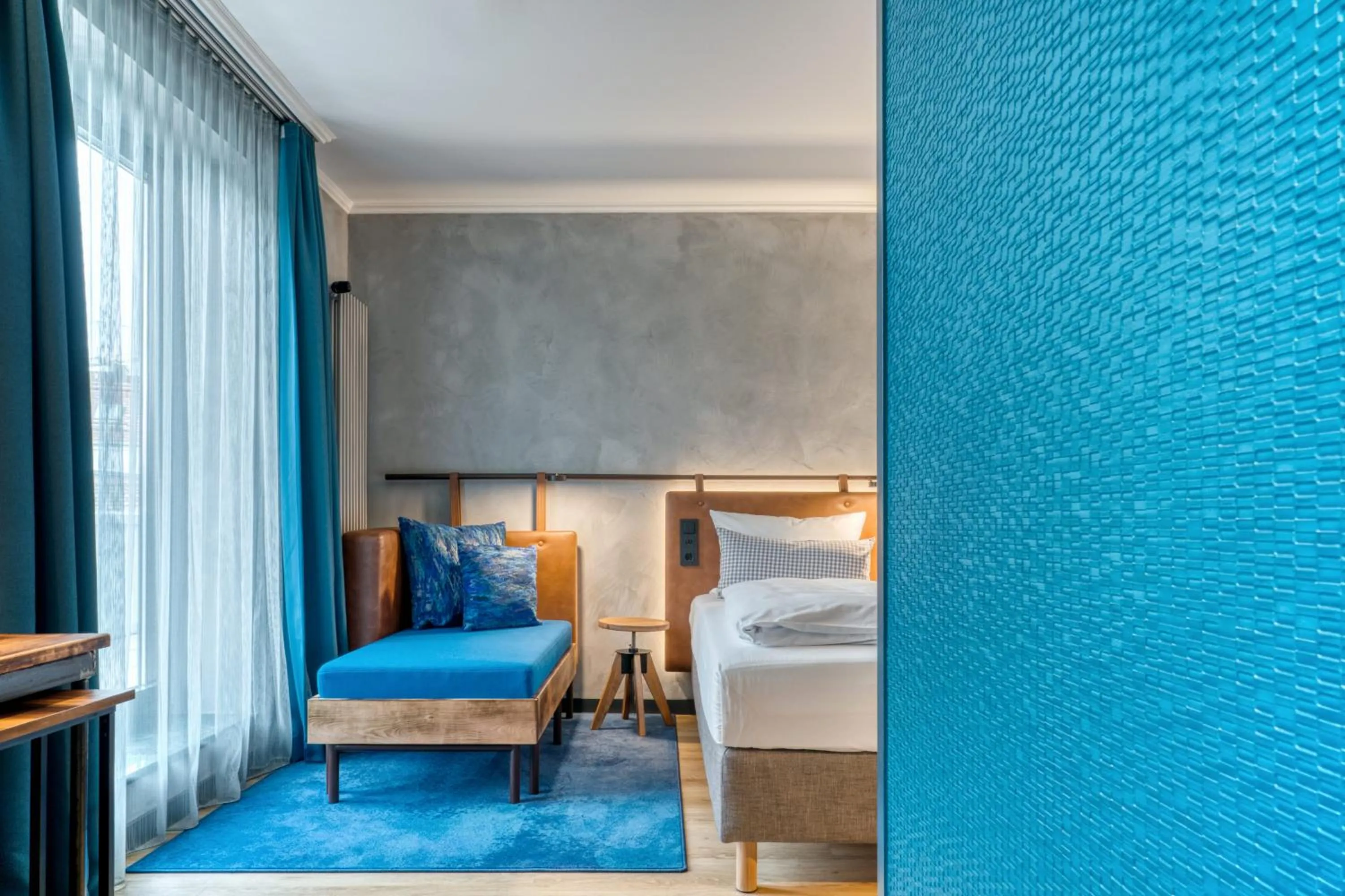 Photo of the whole room, Bed in Unsöld's Factory Hotel