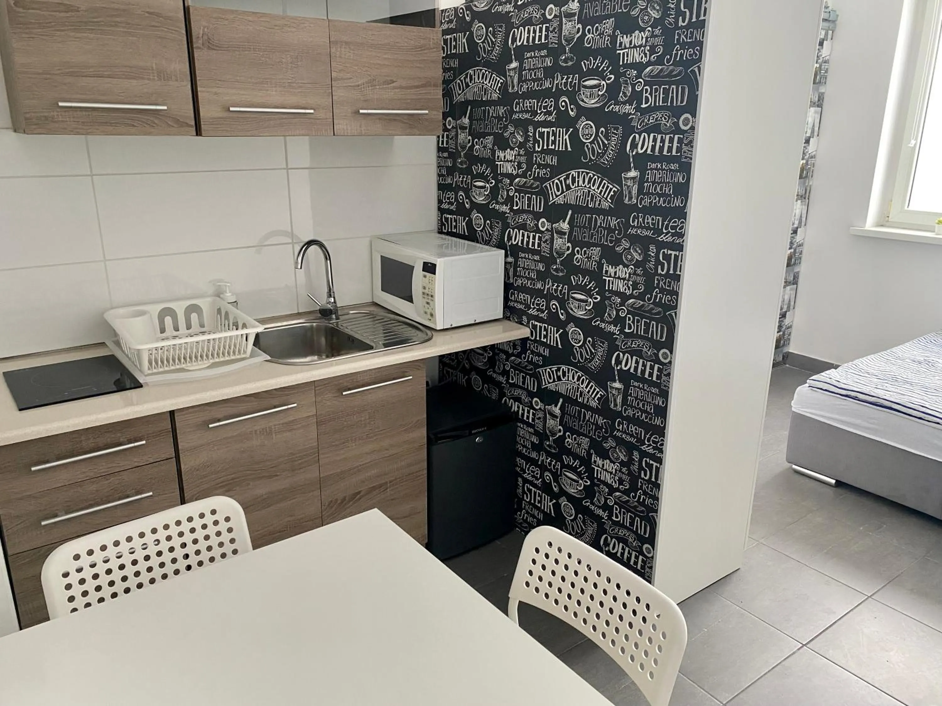Kitchen or kitchenette in Astra Katowice - Aparthotel