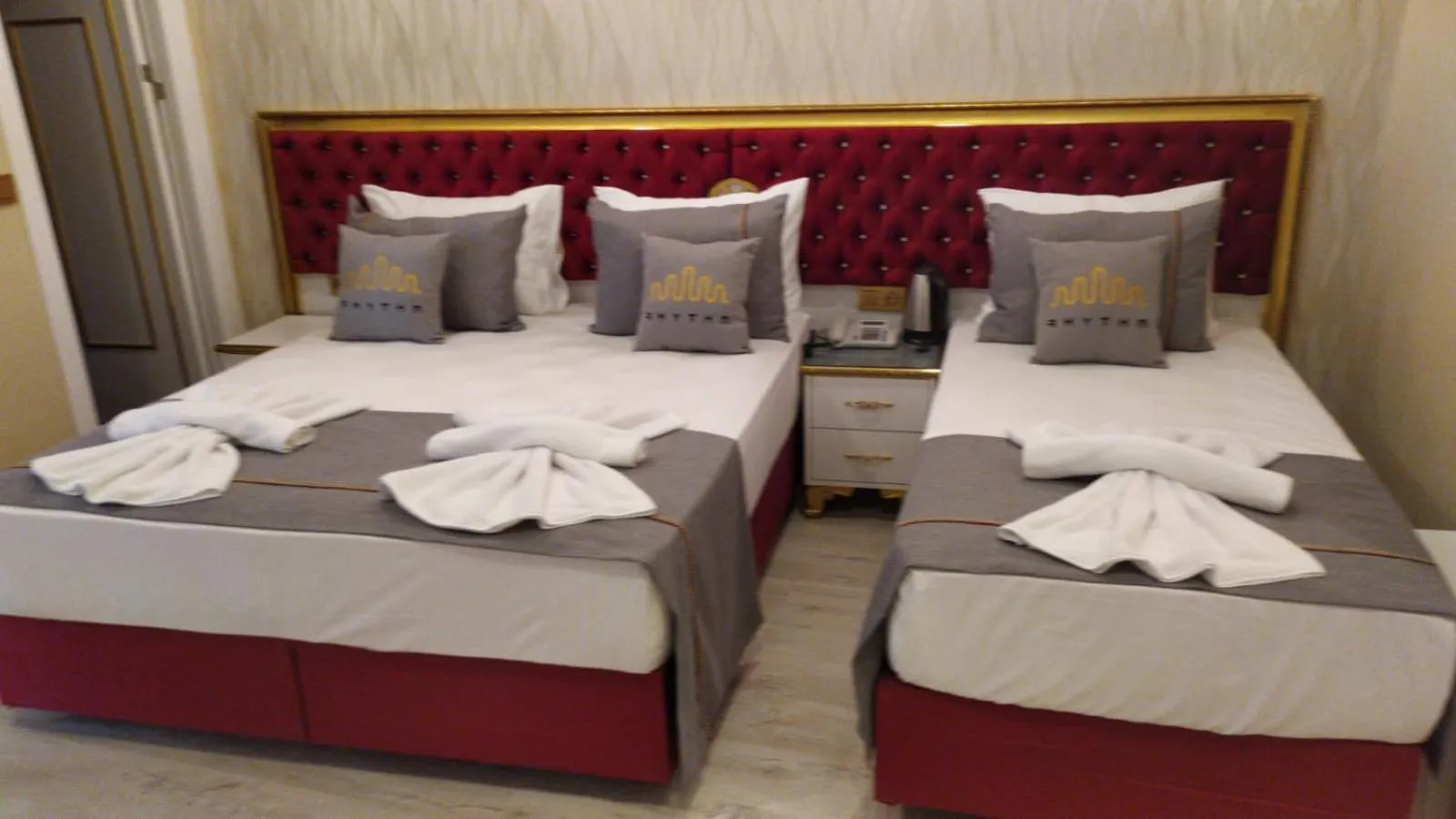 Bed in RHYTHM HOTEL