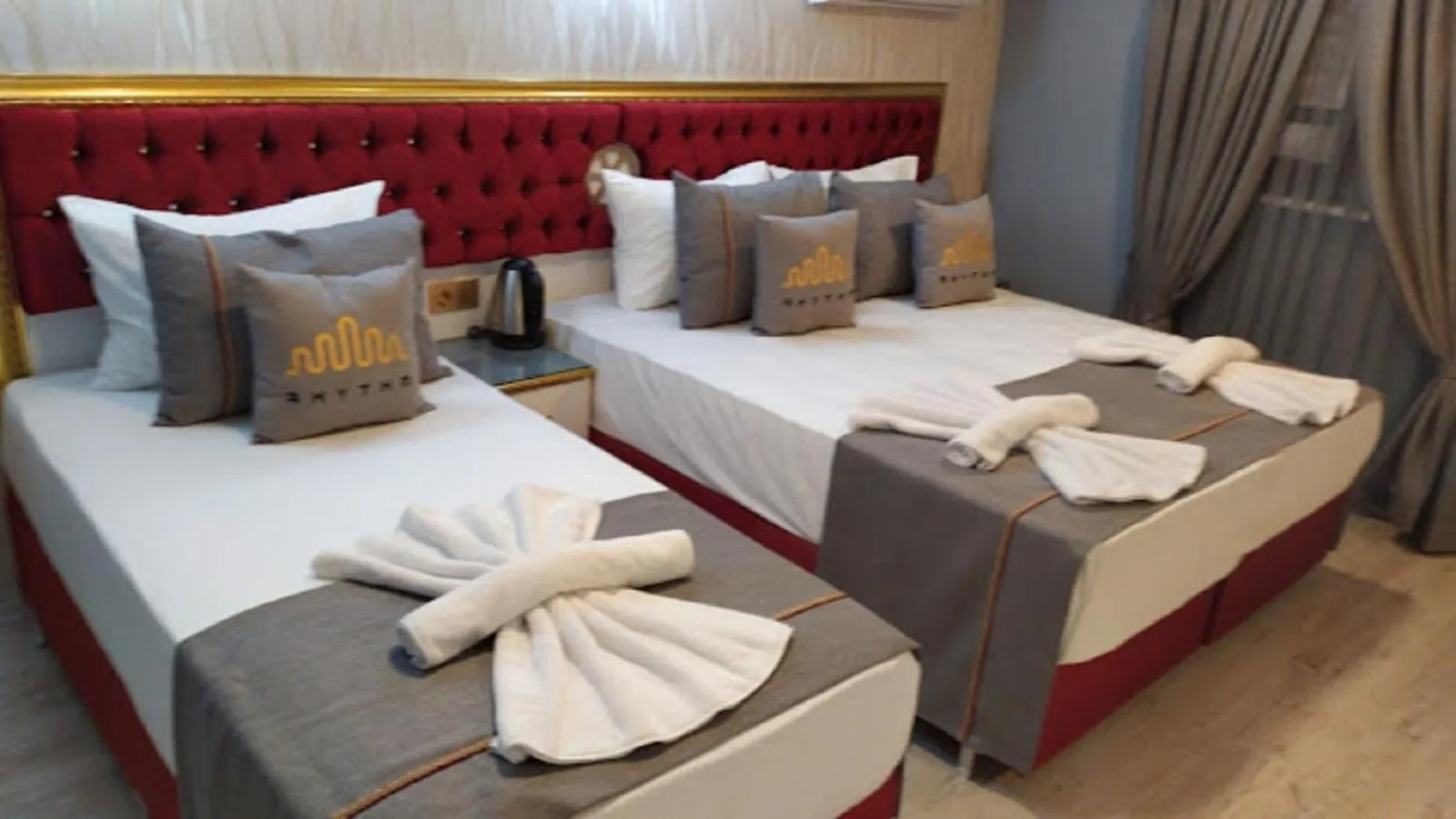 Bed in RHYTHM HOTEL