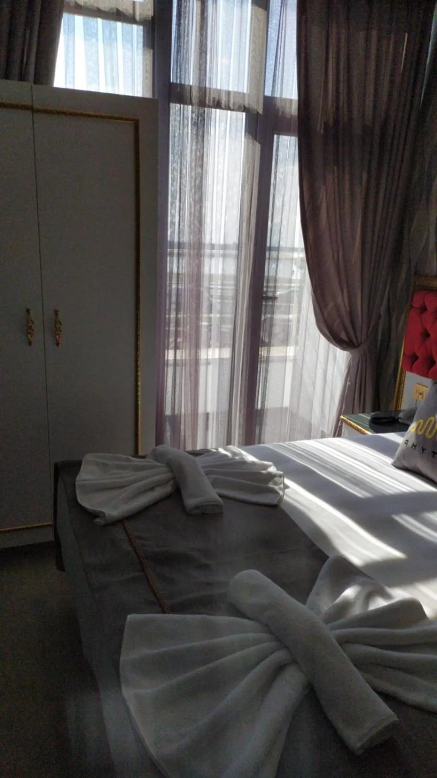 Bed in RHYTHM HOTEL
