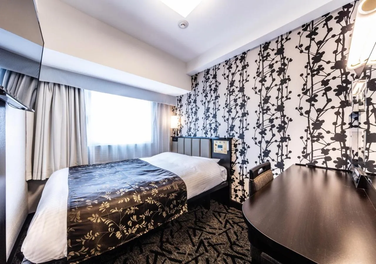 Photo of the whole room, Bed in APA Hotel Higashi Shinjuku Kabukicho Tower