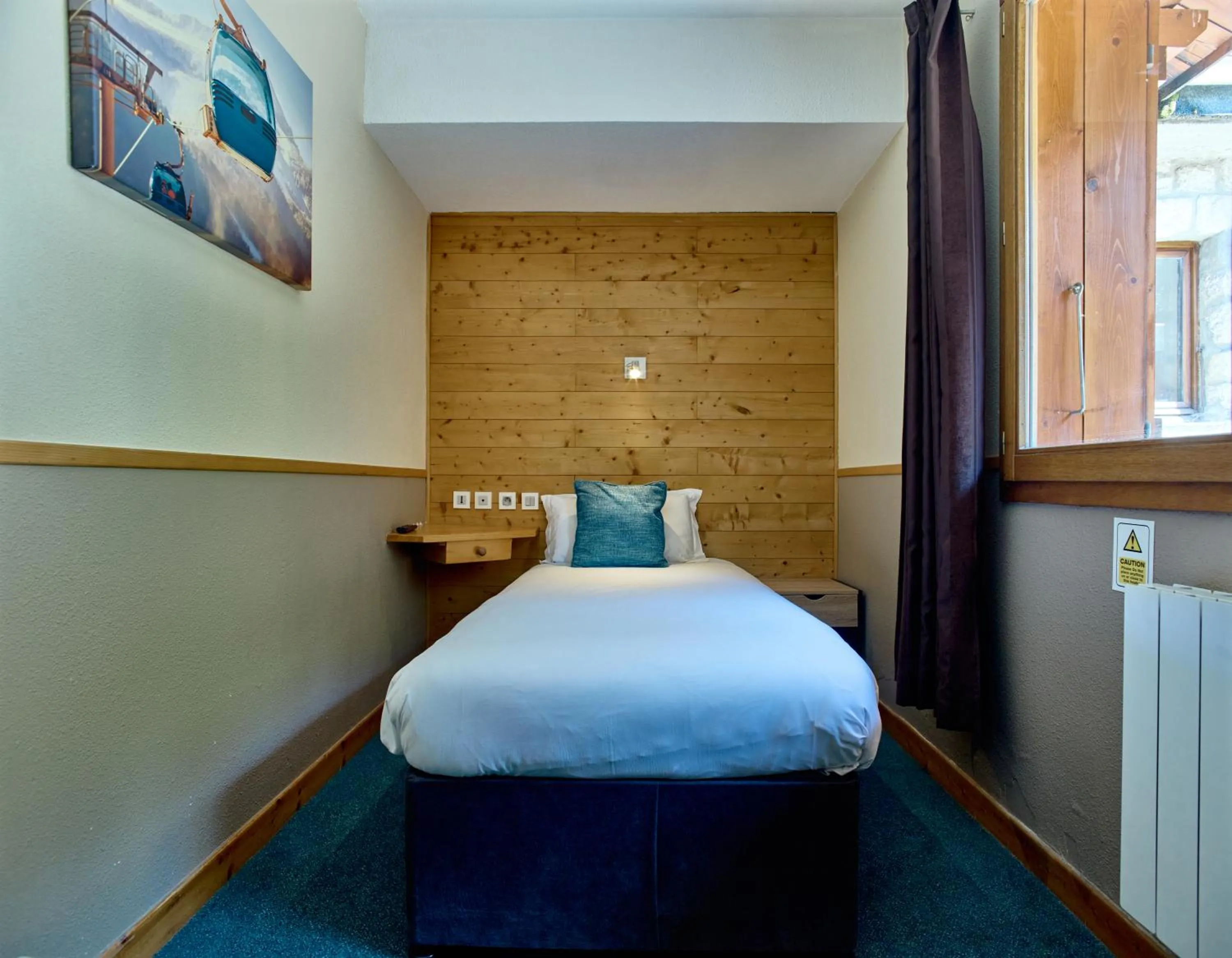 Bed in Hôtel Les Grangettes