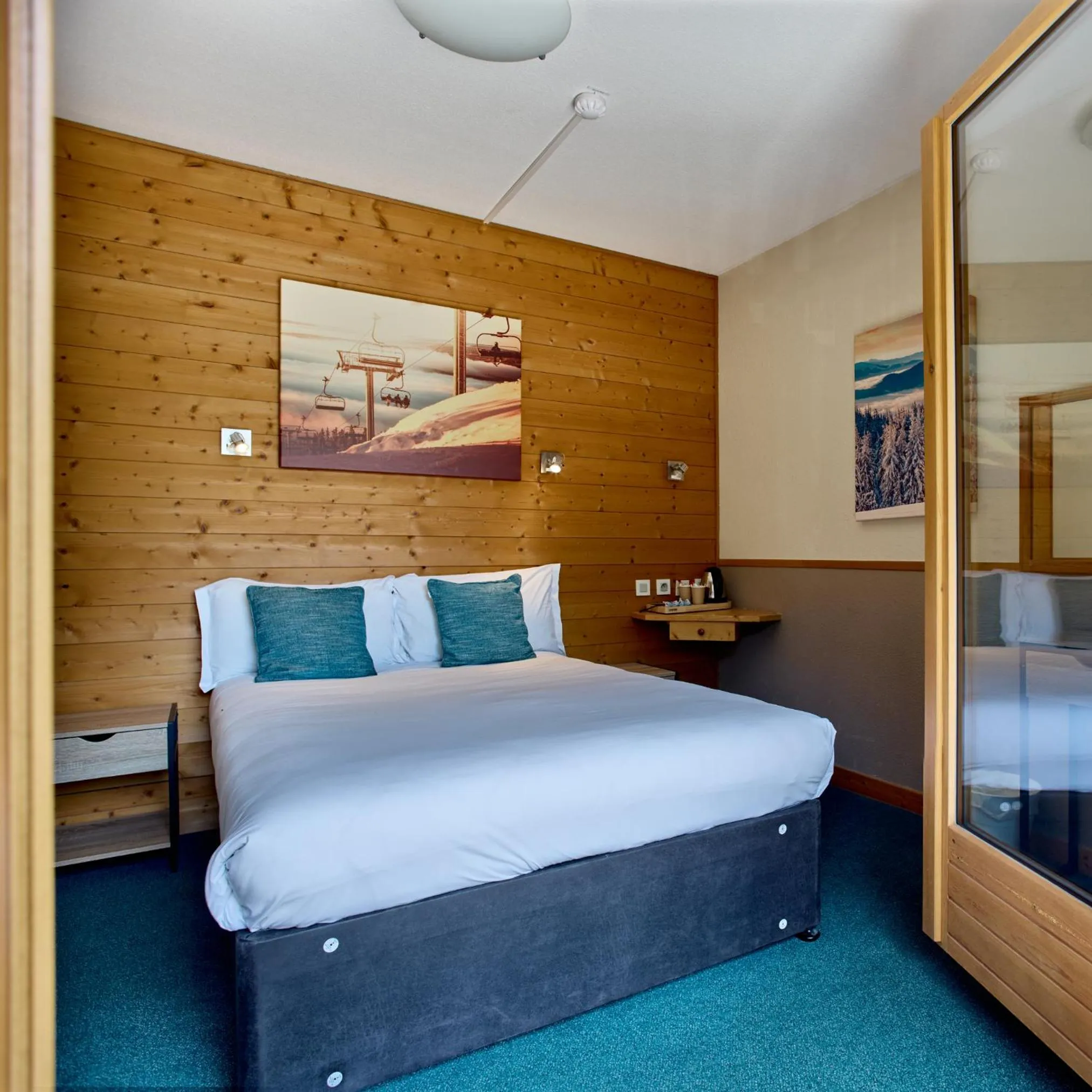 Bed in Hôtel Les Grangettes