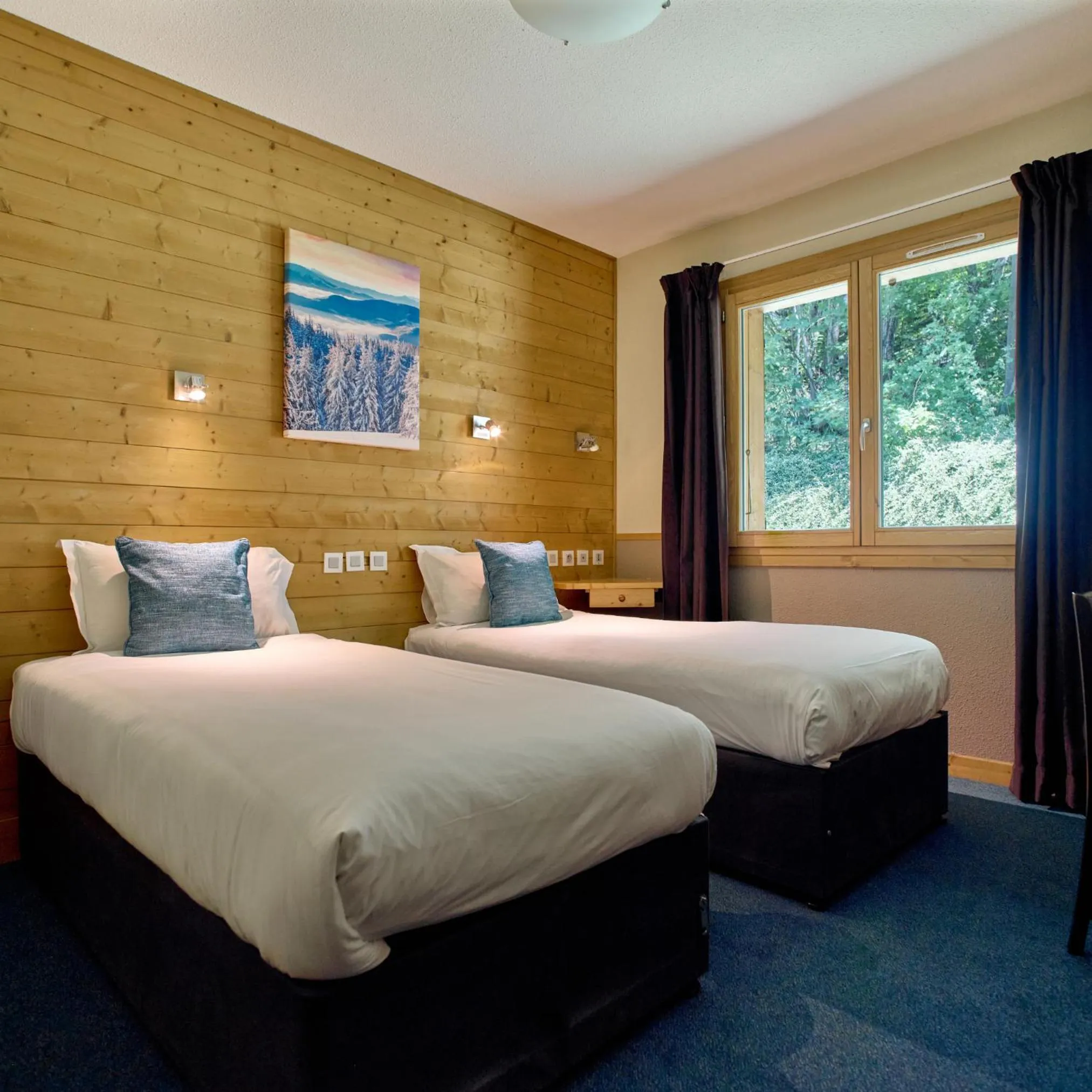 Bed in Hôtel Les Grangettes