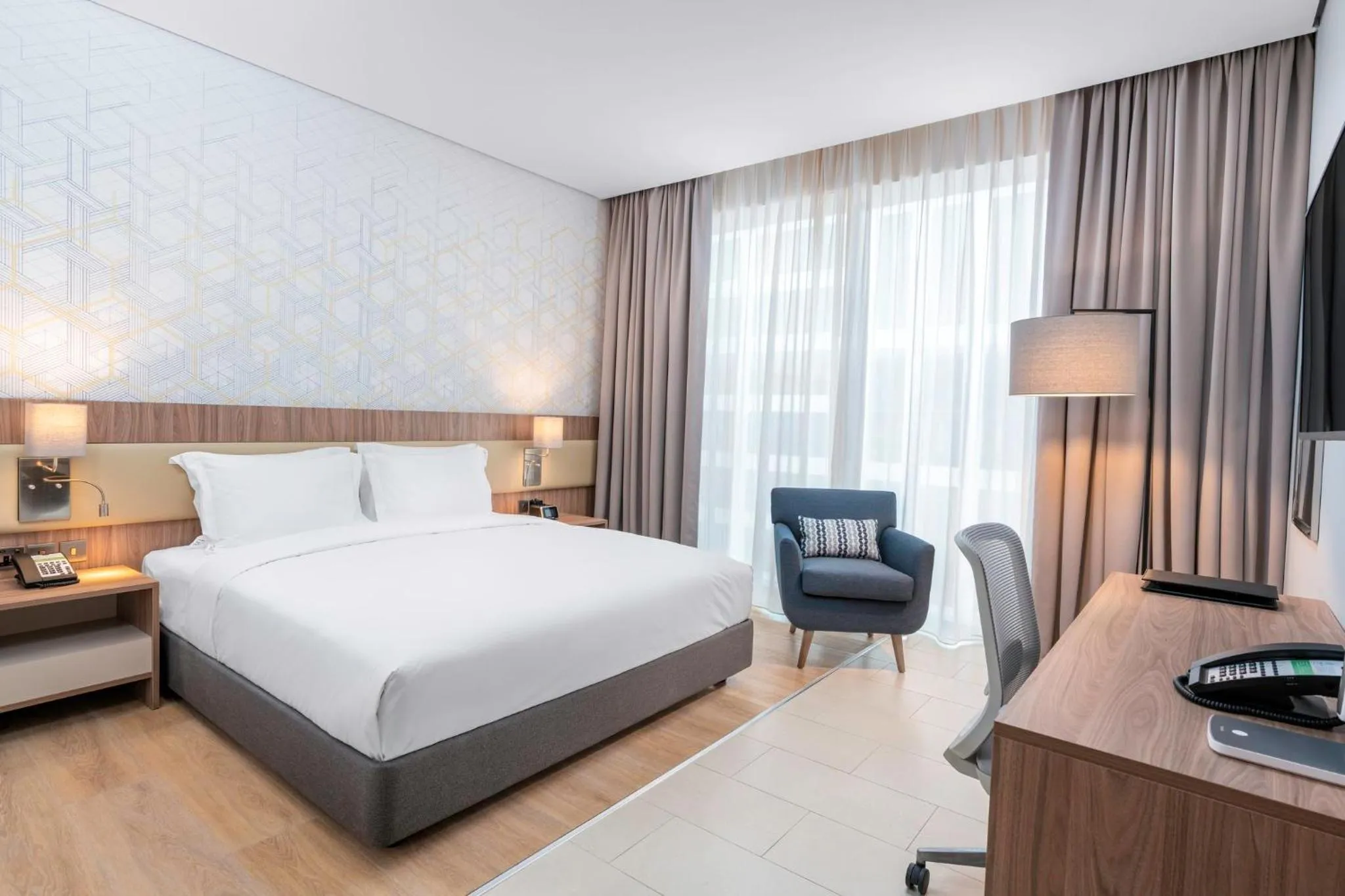 Photo of the whole room, Bed in Holiday Inn & Suites Al Jubail by IHG