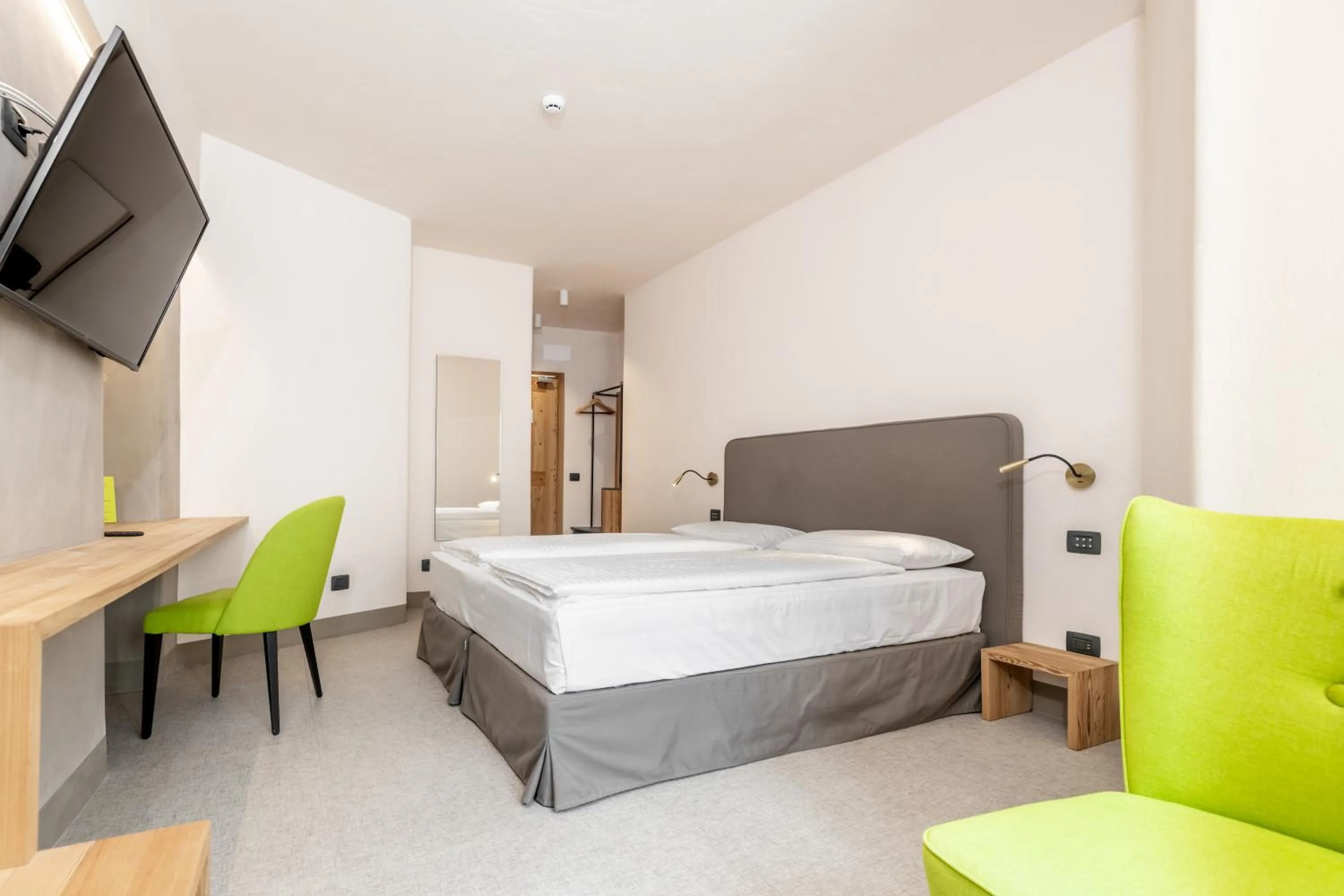 Bed in Curt di Clement Eco Mobility Hotel