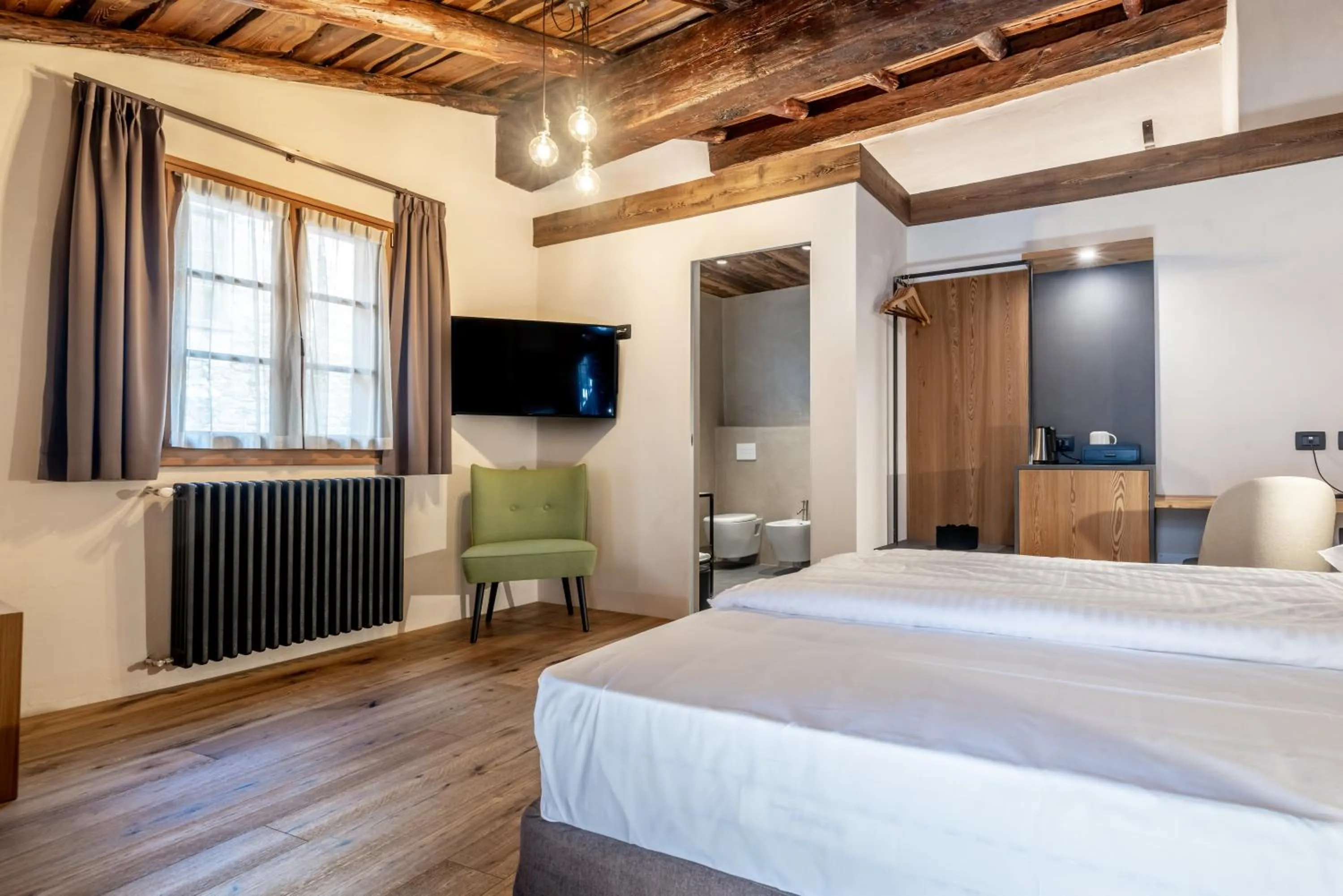 Photo of the whole room, Bed in Curt di Clement Eco Mobility Hotel