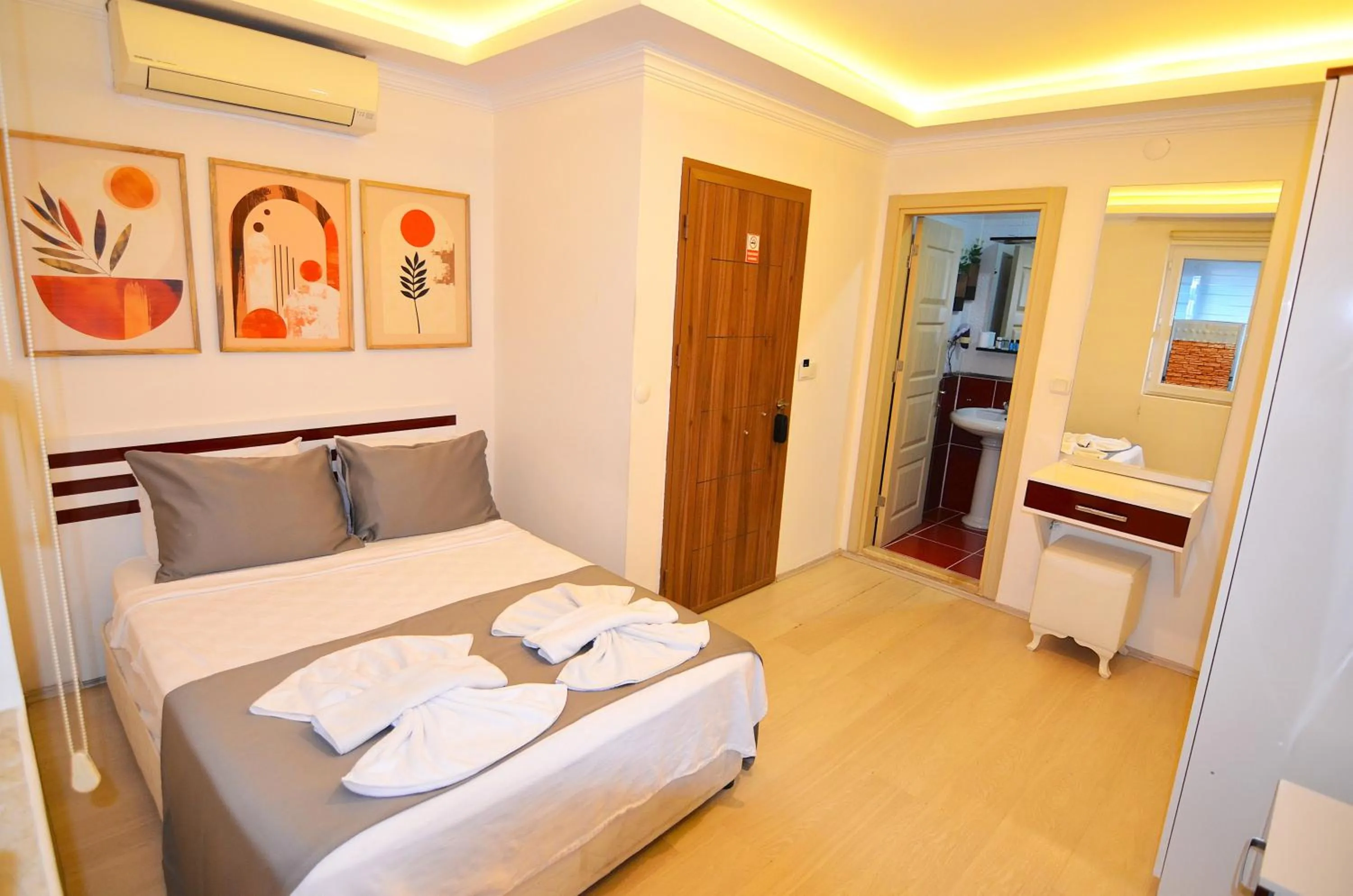 Bed in Mykonut Apart Hotel