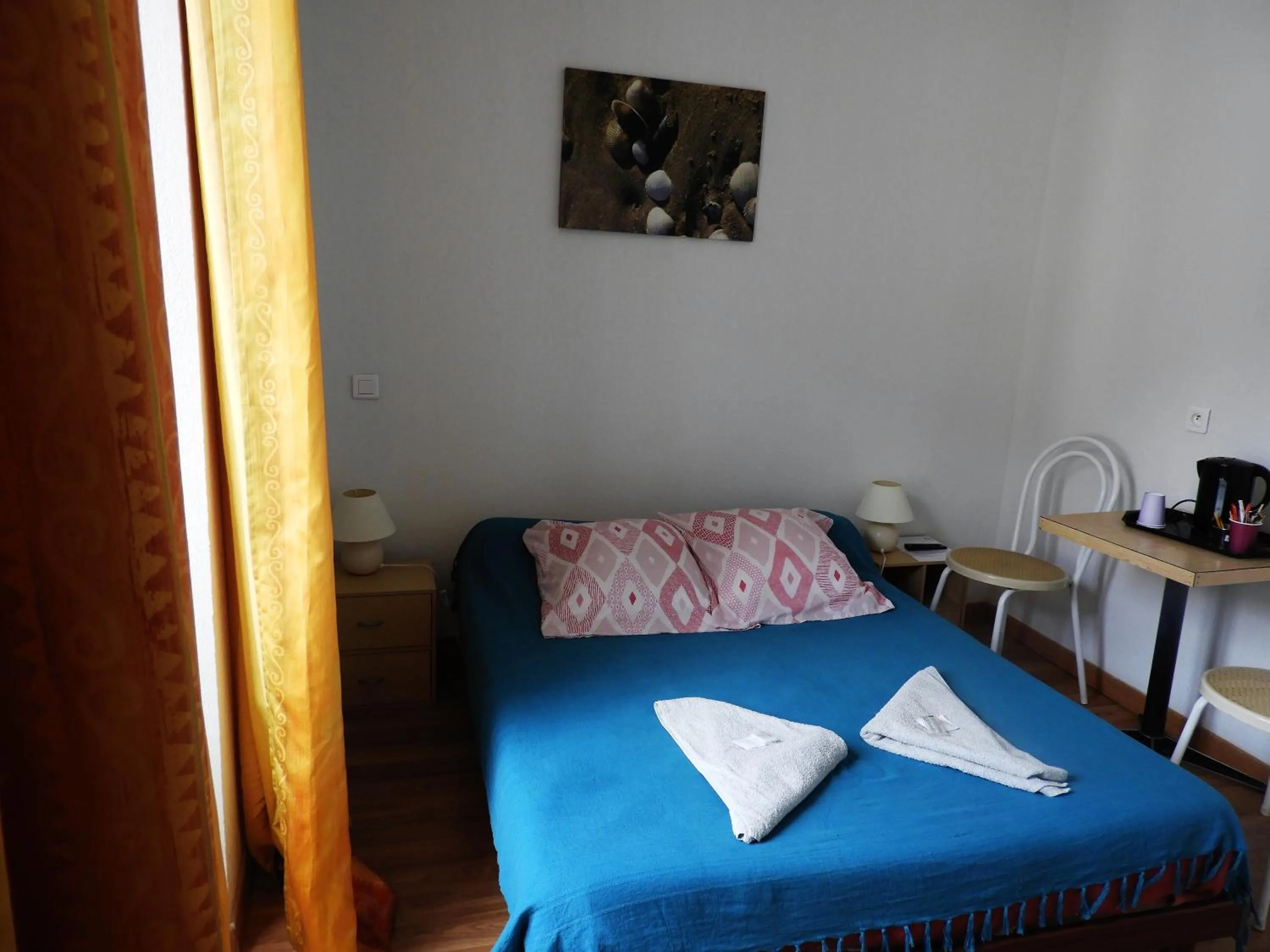 Bed in Le Relais des Cavaliers