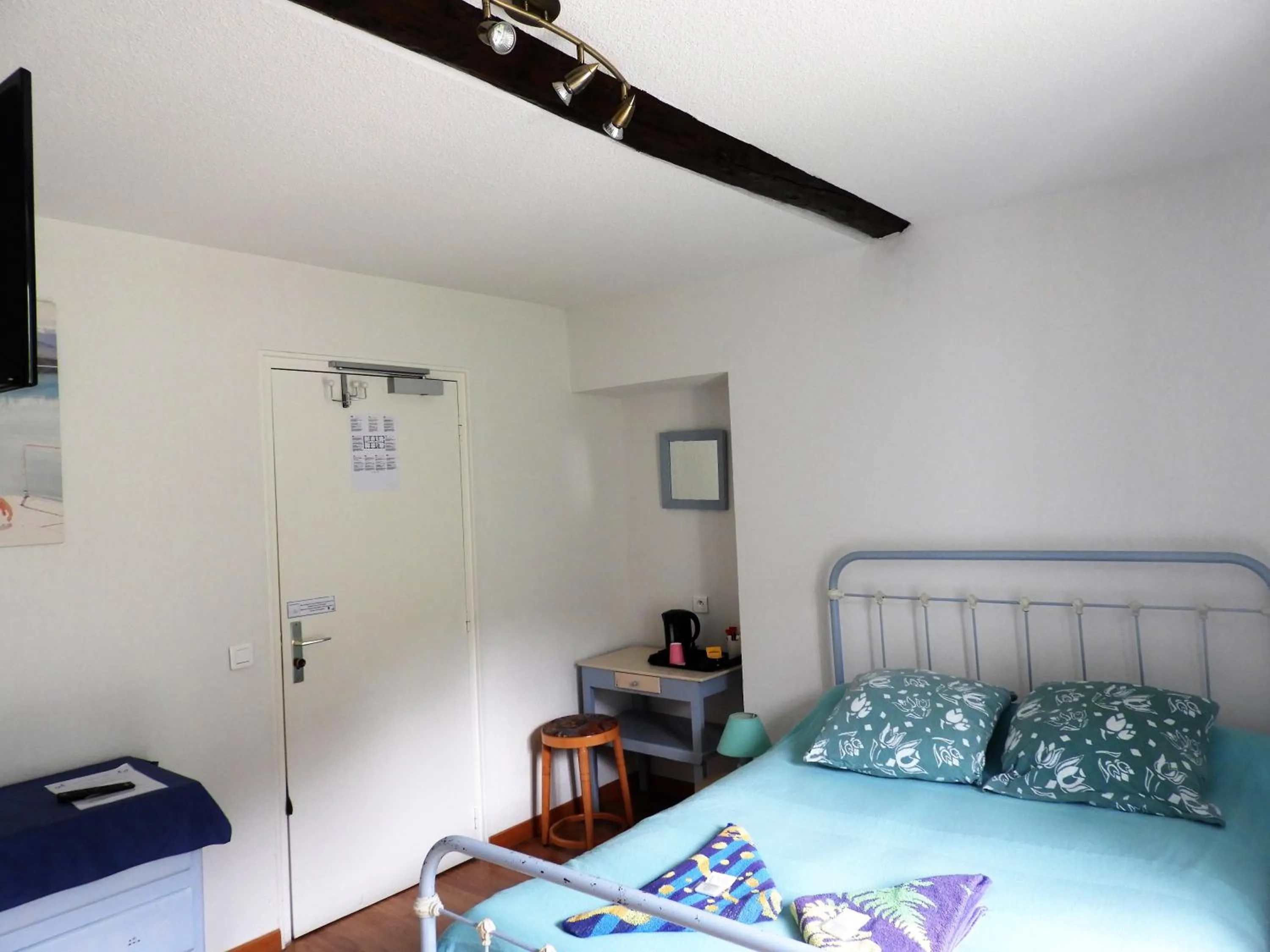 Bed in Le Relais des Cavaliers