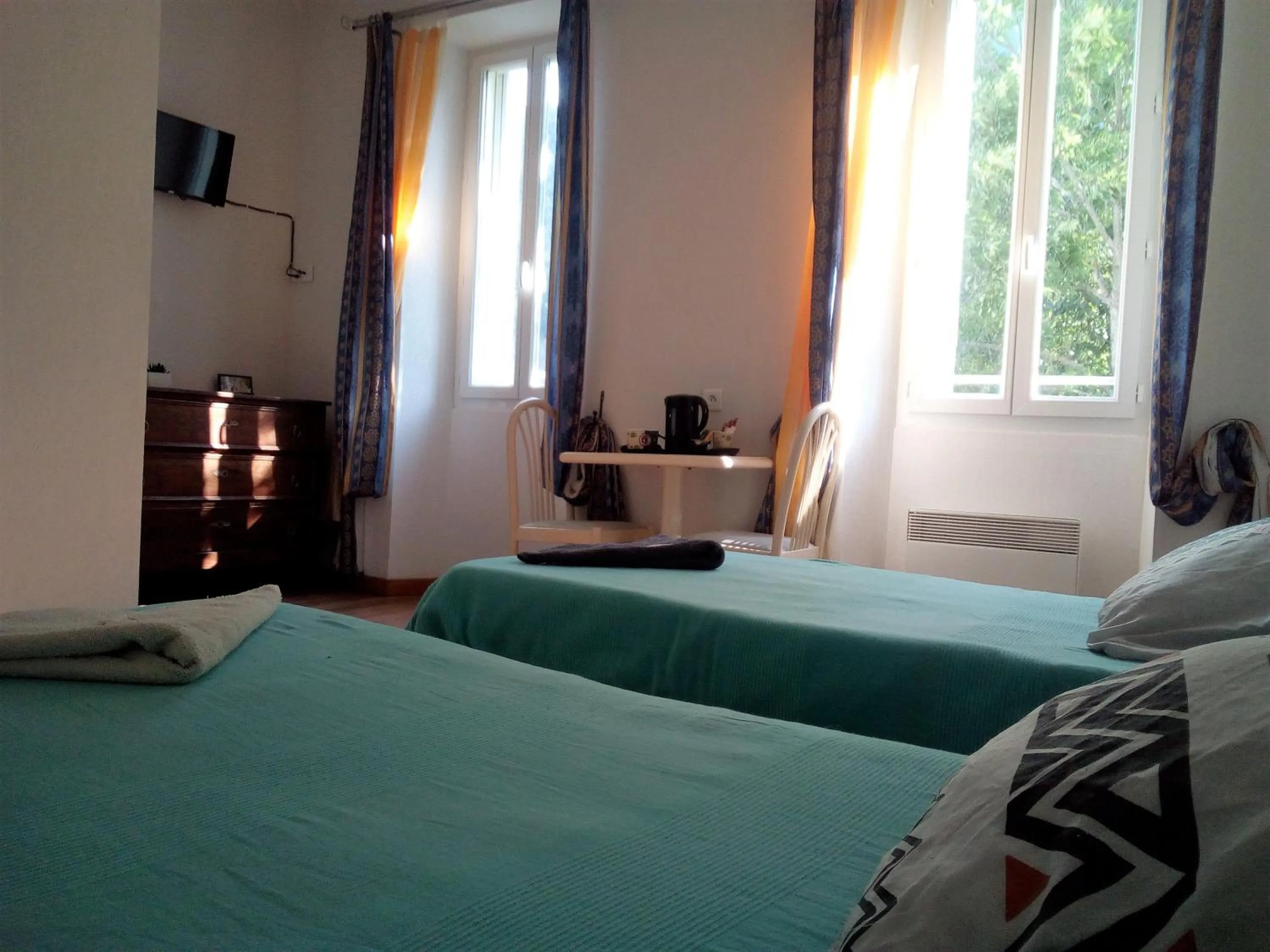 Bed in Le Relais des Cavaliers