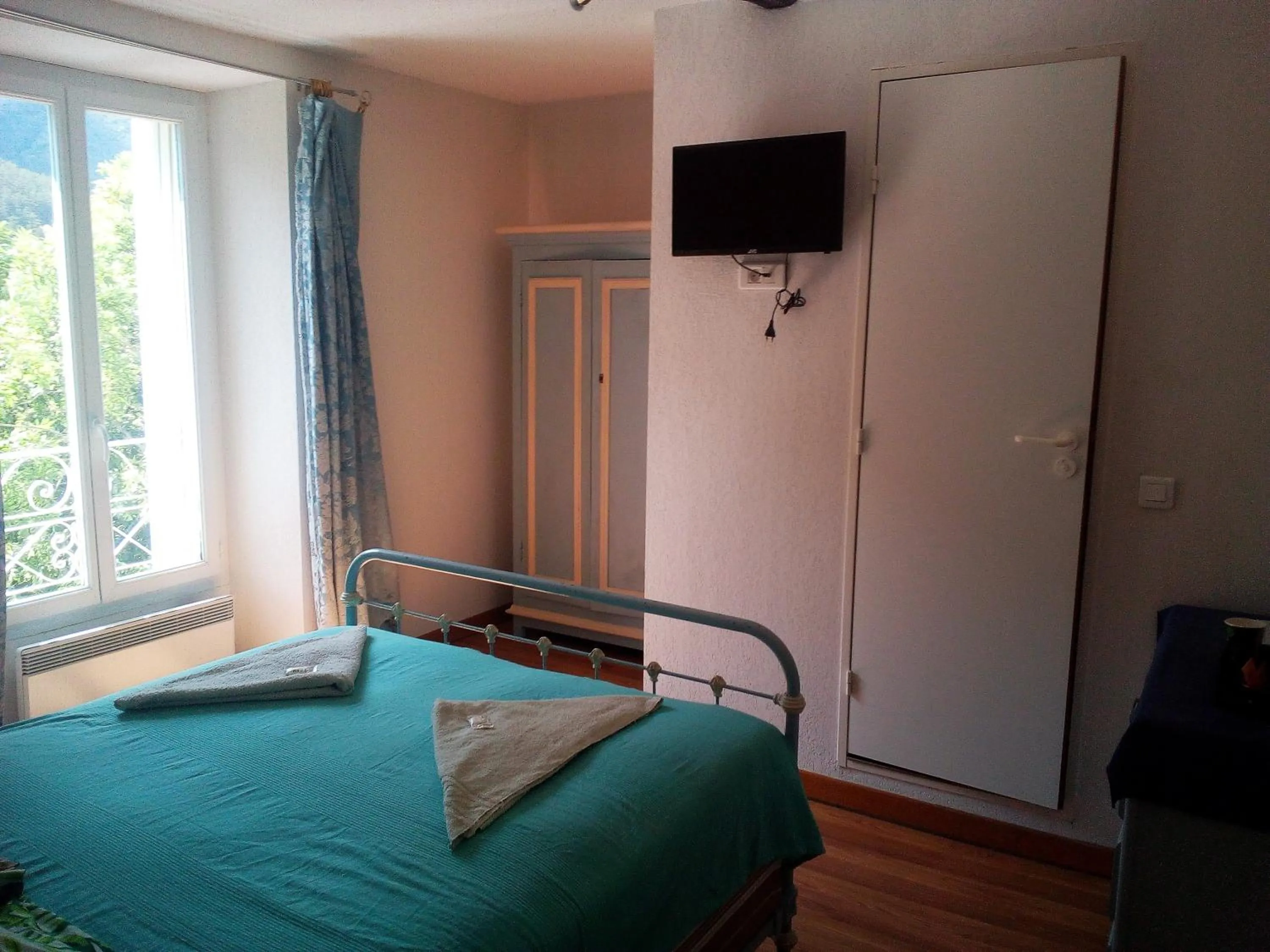 Bed in Le Relais des Cavaliers