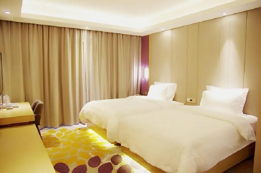 Bed in Lavande Hotel Neijiang High-speed Railway Station Peace Plaza