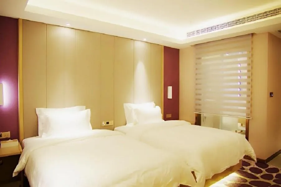 Bed in Lavande Hotel Neijiang High-speed Railway Station Peace Plaza