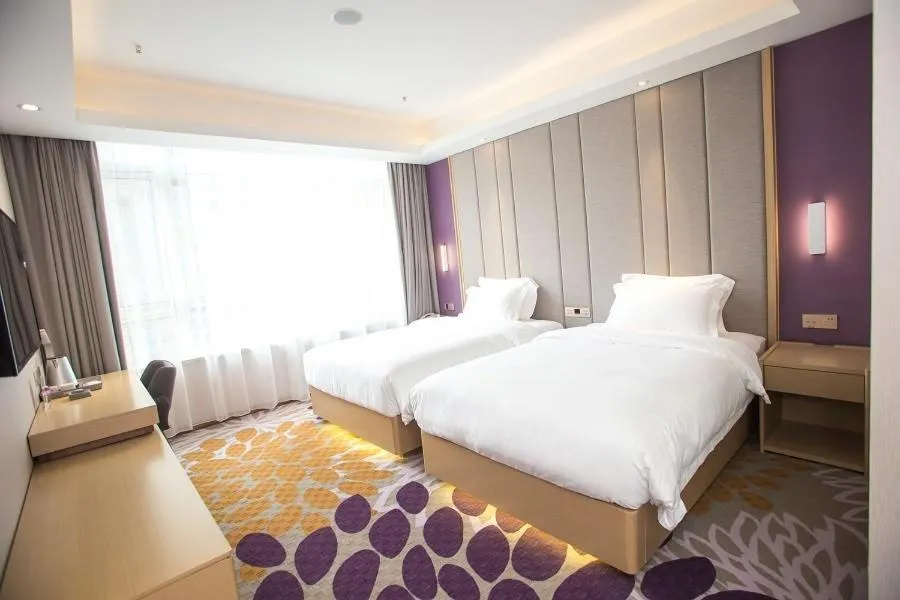 Bed in Lavande Hotel Neijiang High-speed Railway Station Peace Plaza