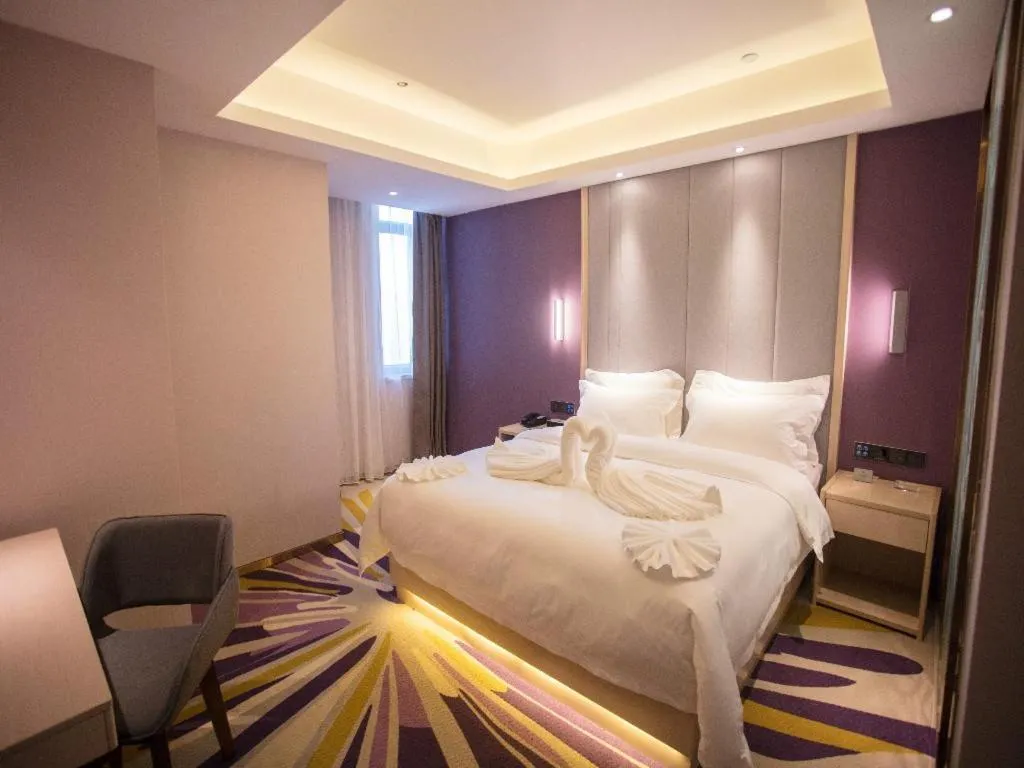 Bed in Lavande Hotel Korla city government swan lake