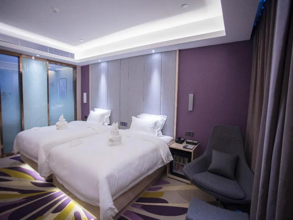 Bed in Lavande Hotel Korla city government swan lake