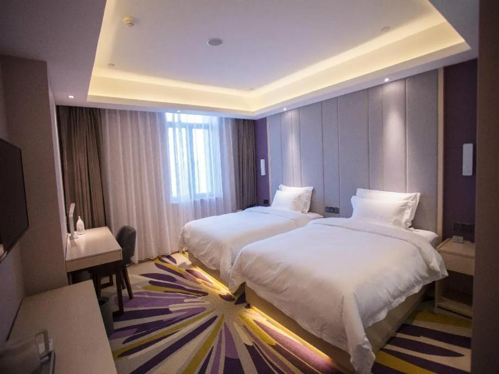 Bed in Lavande Hotel Korla city government swan lake