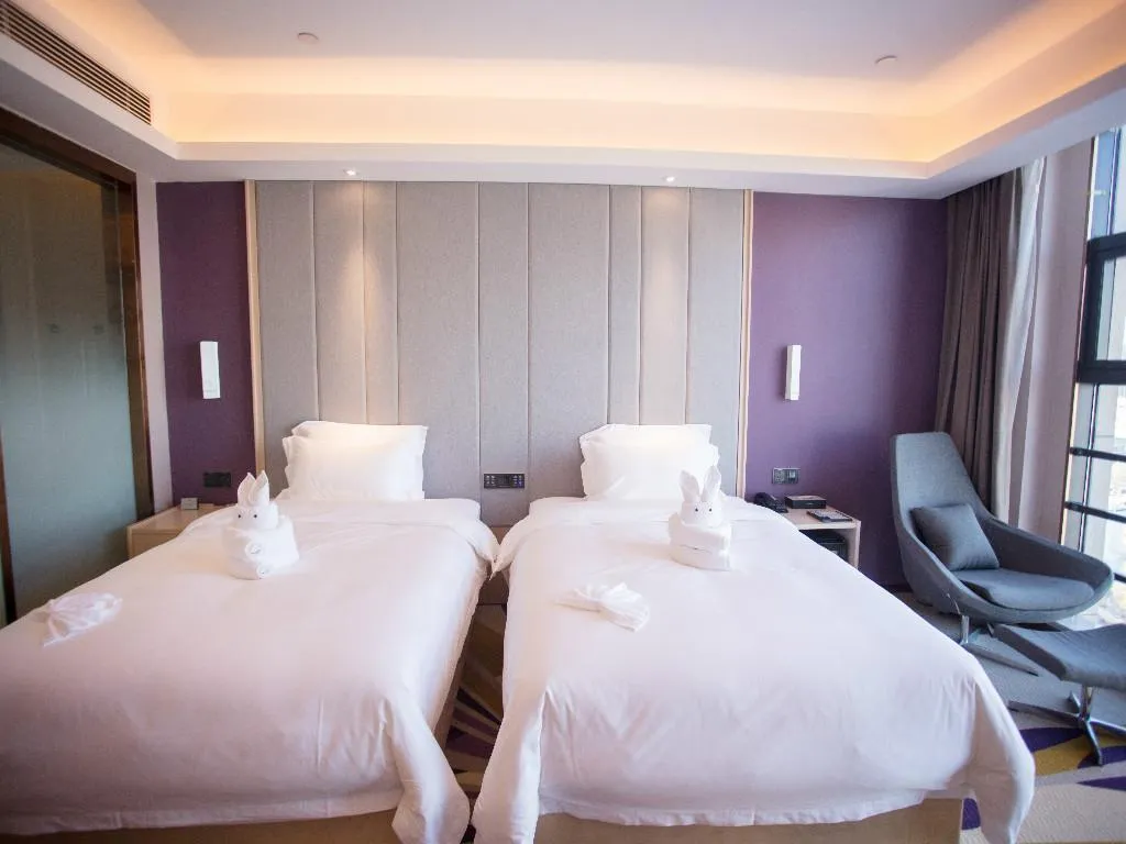 Bed in Lavande Hotel Korla city government swan lake