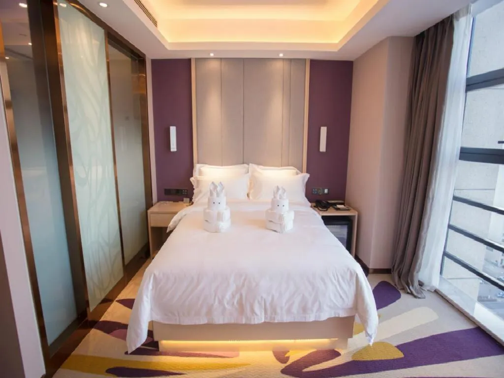 Bed in Lavande Hotel Korla city government swan lake