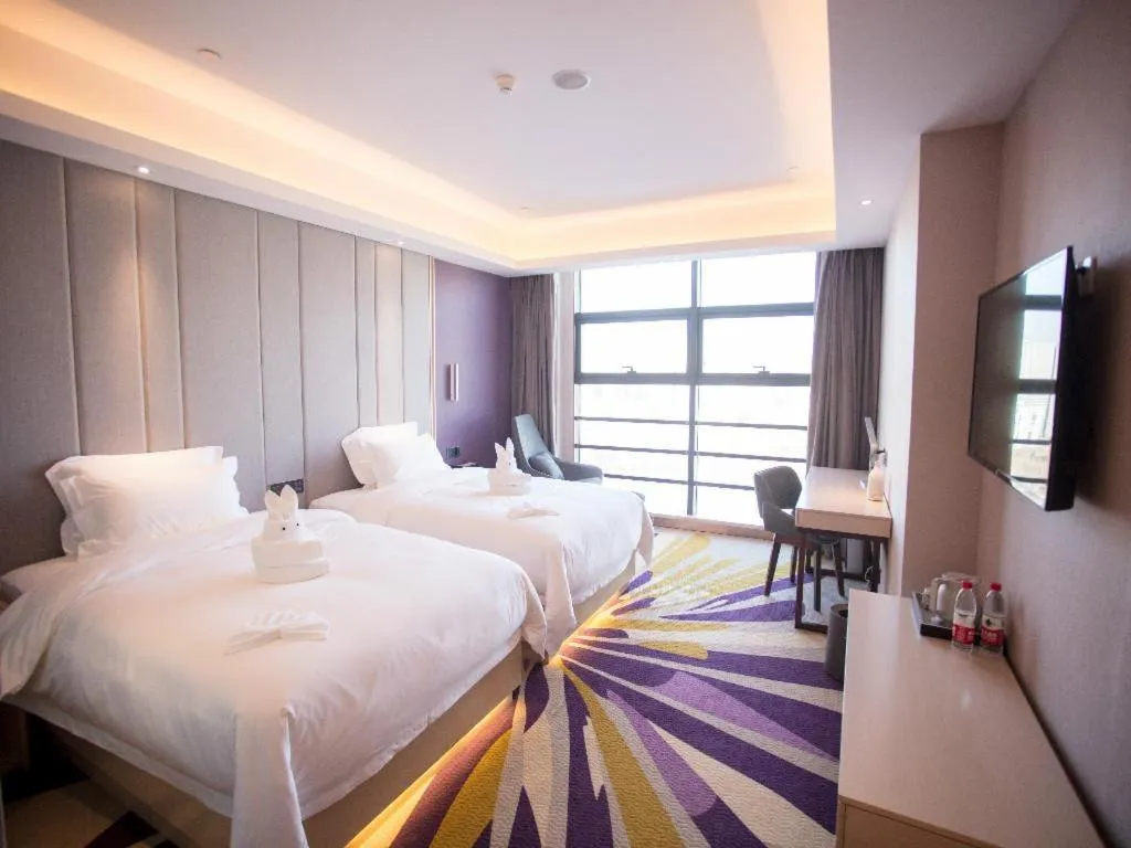 Bed in Lavande Hotel Korla city government swan lake