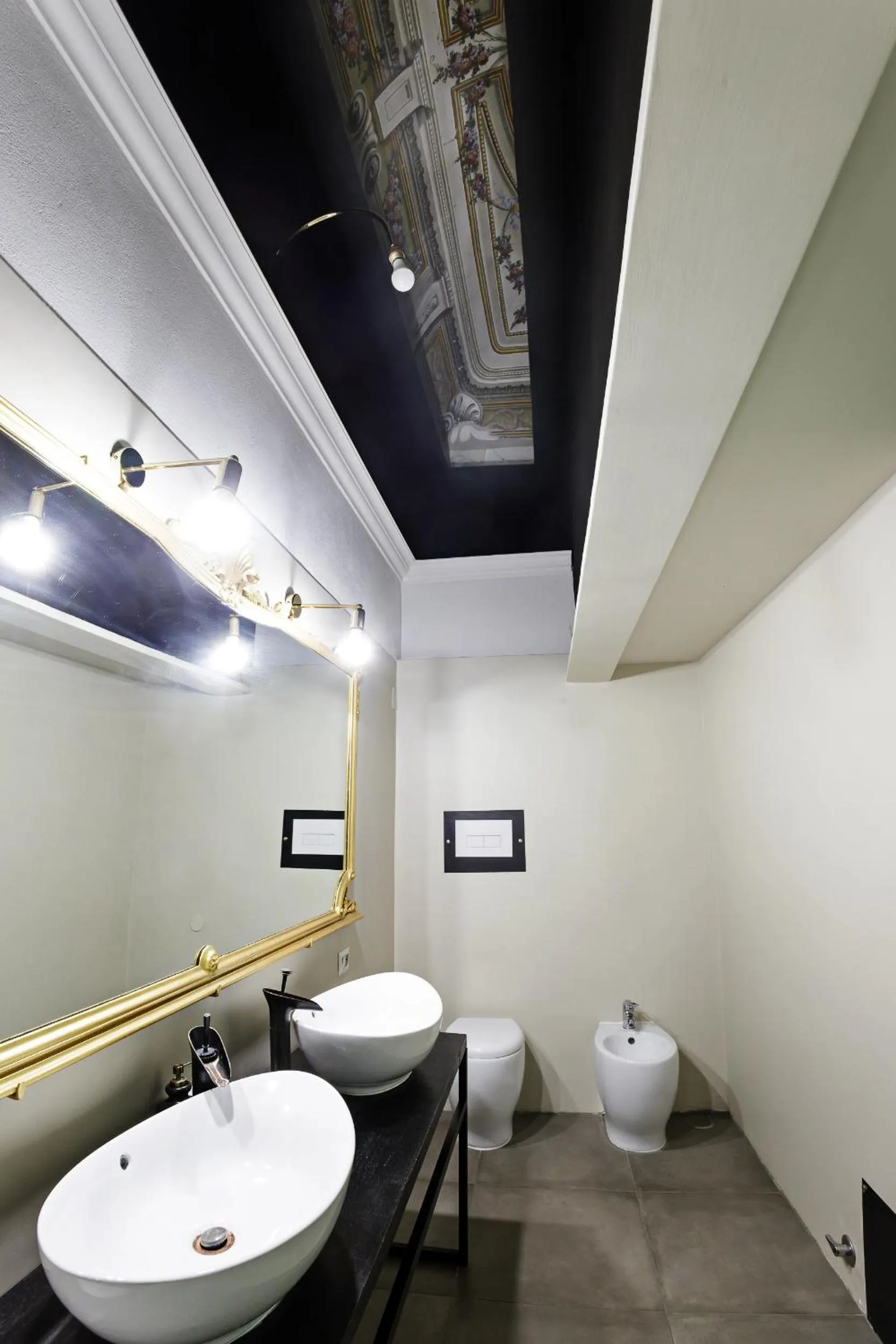 Bathroom in Palà Suites