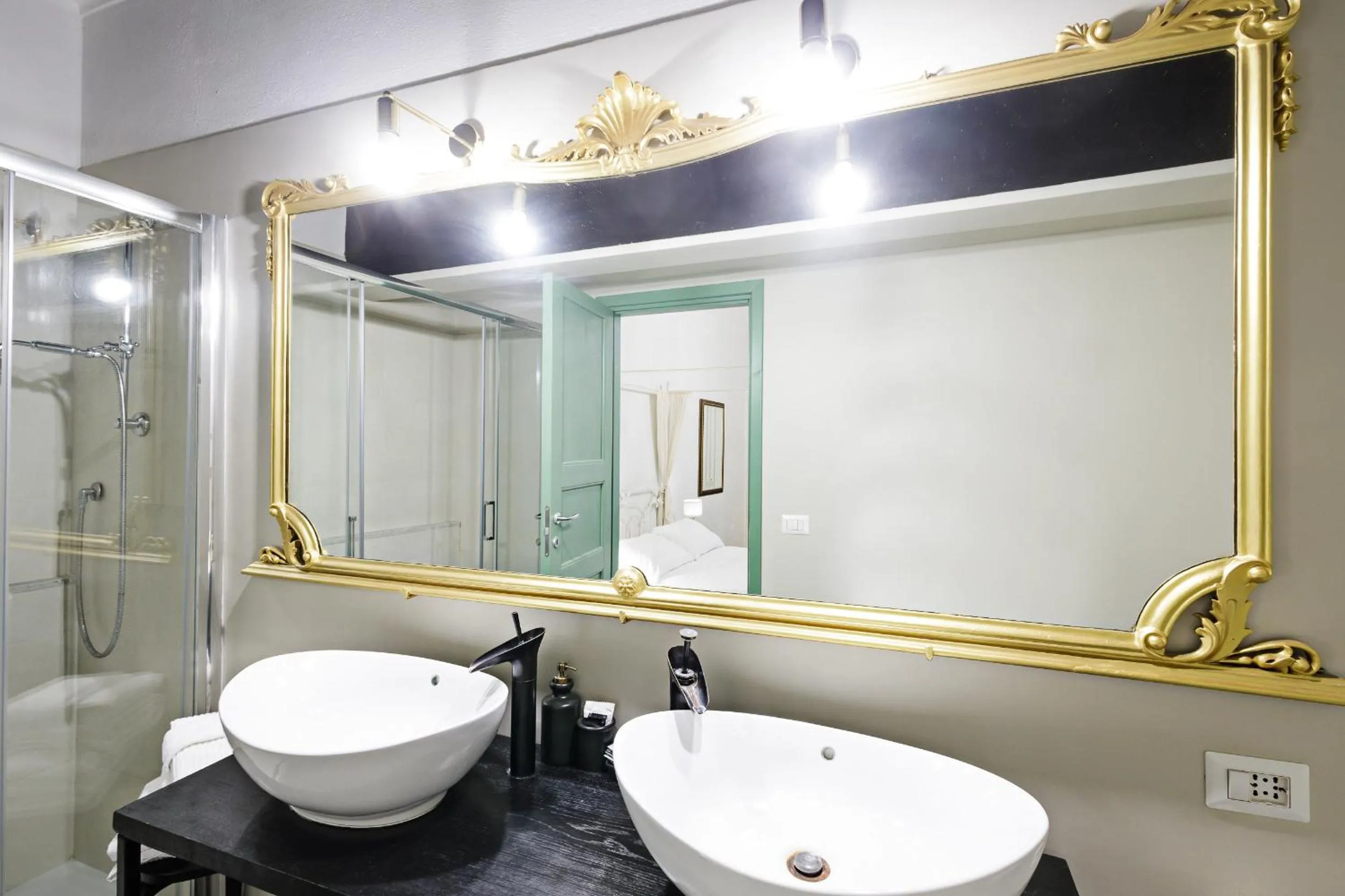 Bathroom in Palà Suites