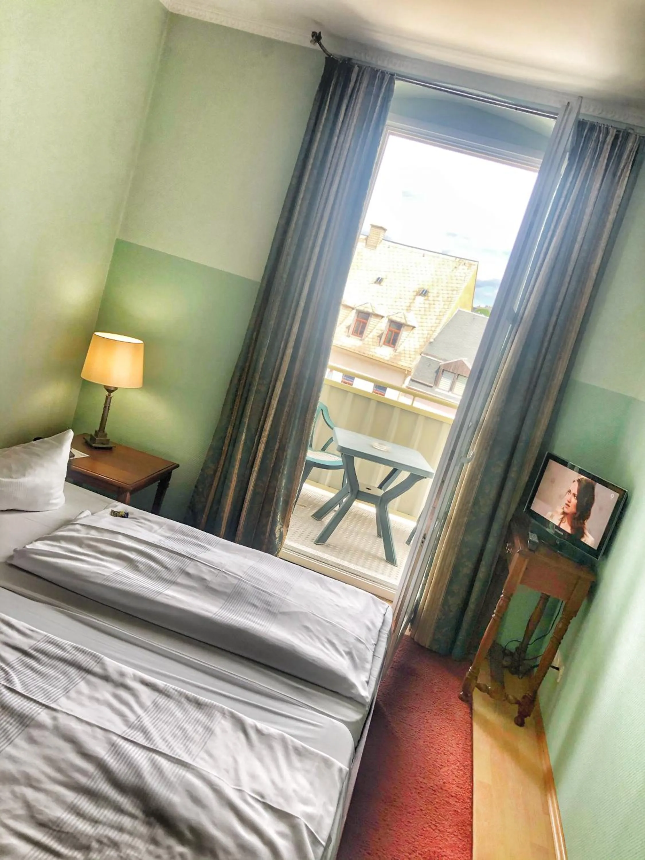 Photo of the whole room, Bed in Hotel Wilder Mann Annaberg-Buchholz