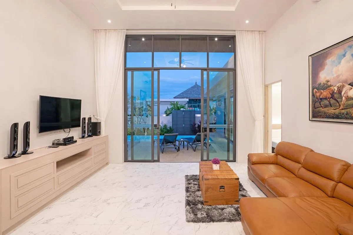 Living room in Gold Chariot Pool Villa, Phuket - SHA Plus Certified