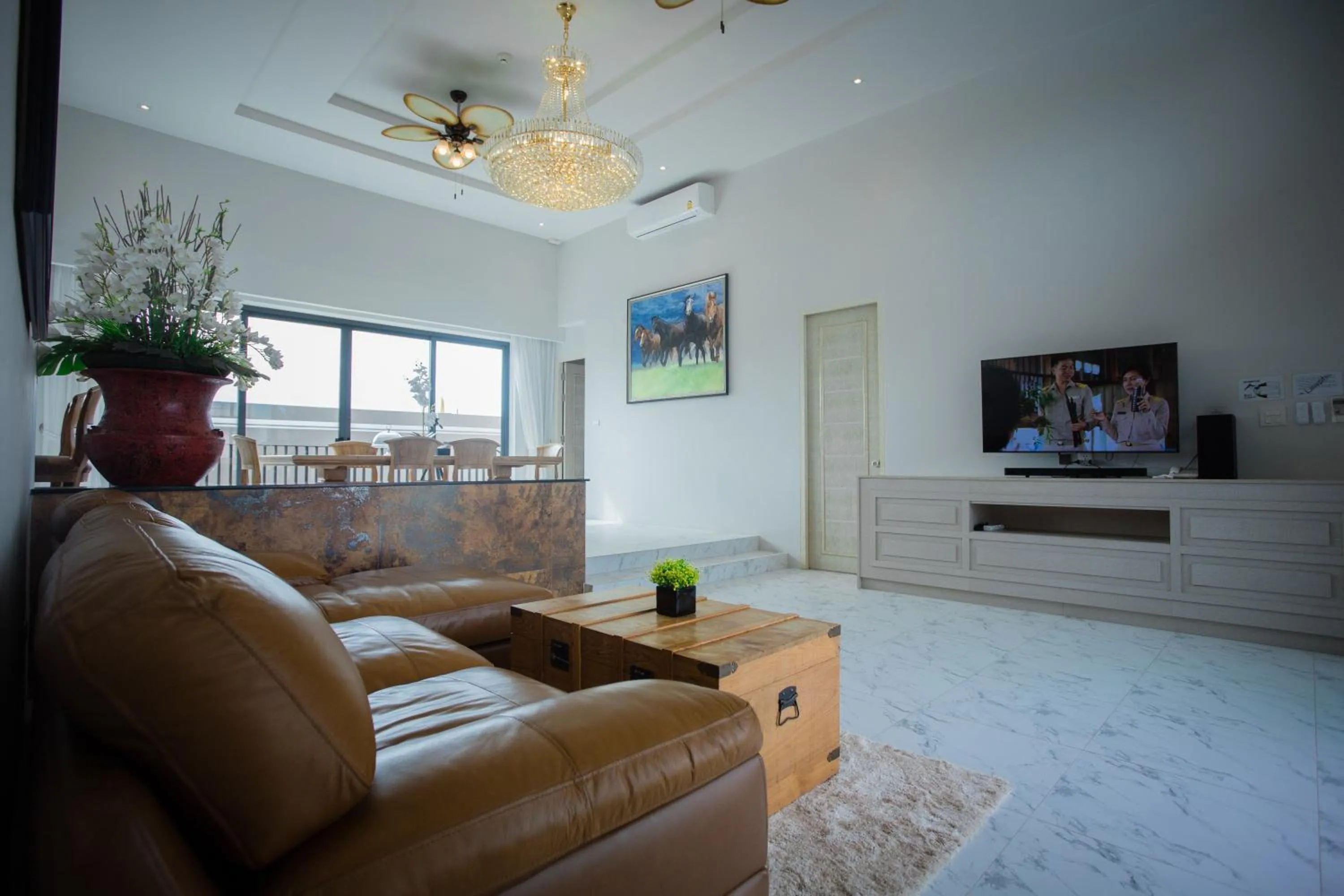 Living room in Gold Chariot Pool Villa, Phuket - SHA Plus Certified