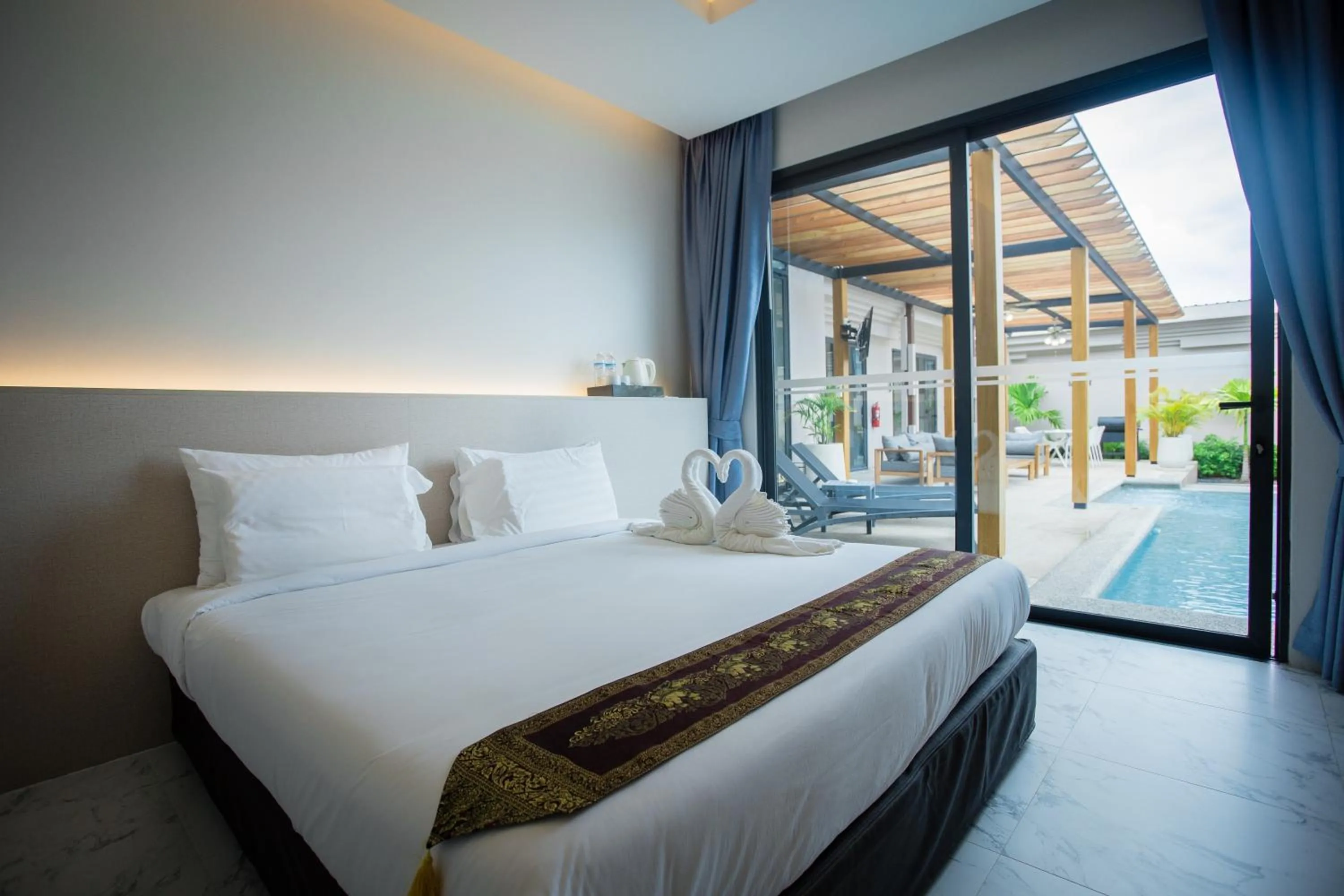 Bed in Gold Chariot Pool Villa, Phuket - SHA Plus Certified