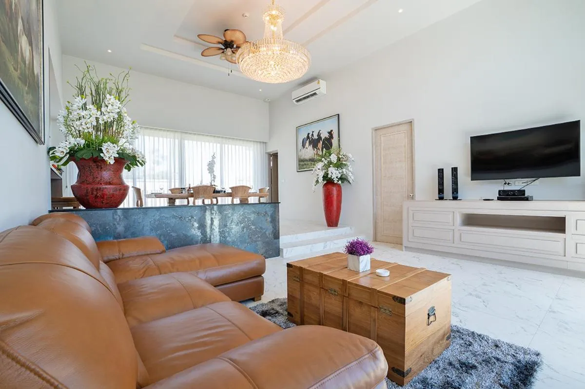 Living room in Gold Chariot Pool Villa, Phuket - SHA Plus Certified