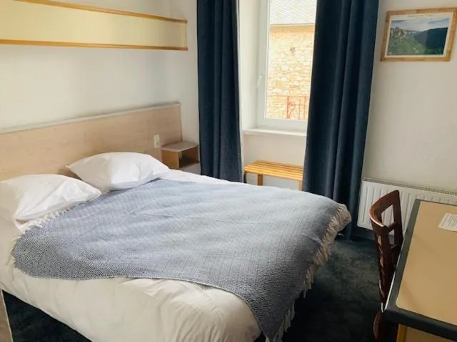 Bedroom in Hôtel-Restaurant La Bergerie