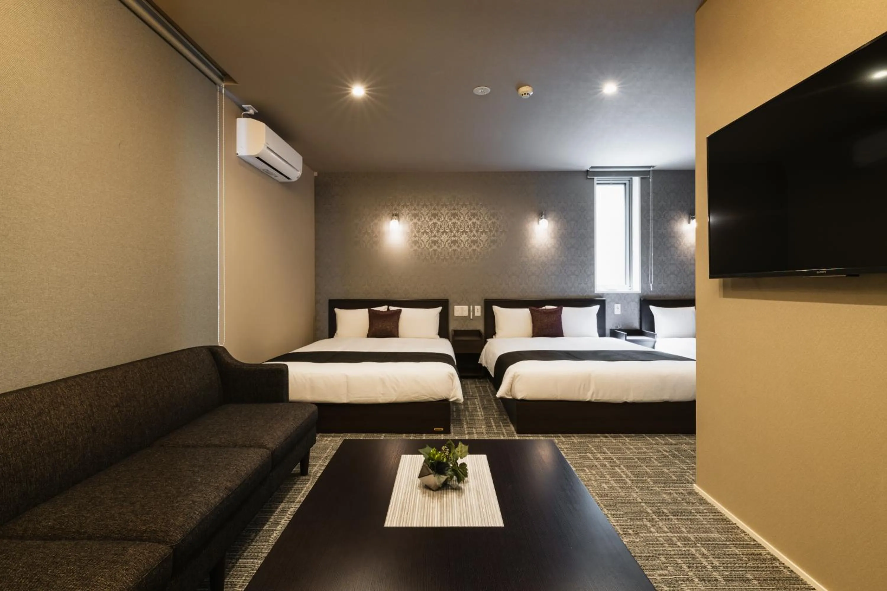 Photo of the whole room, Bed in GRAND BASE Yakuin Odori