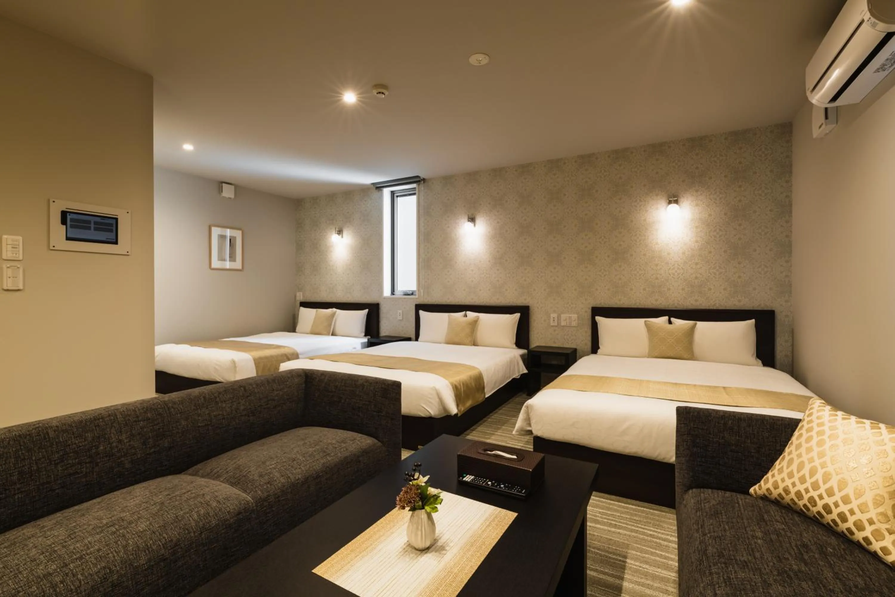 Bed in GRAND BASE Yakuin Odori