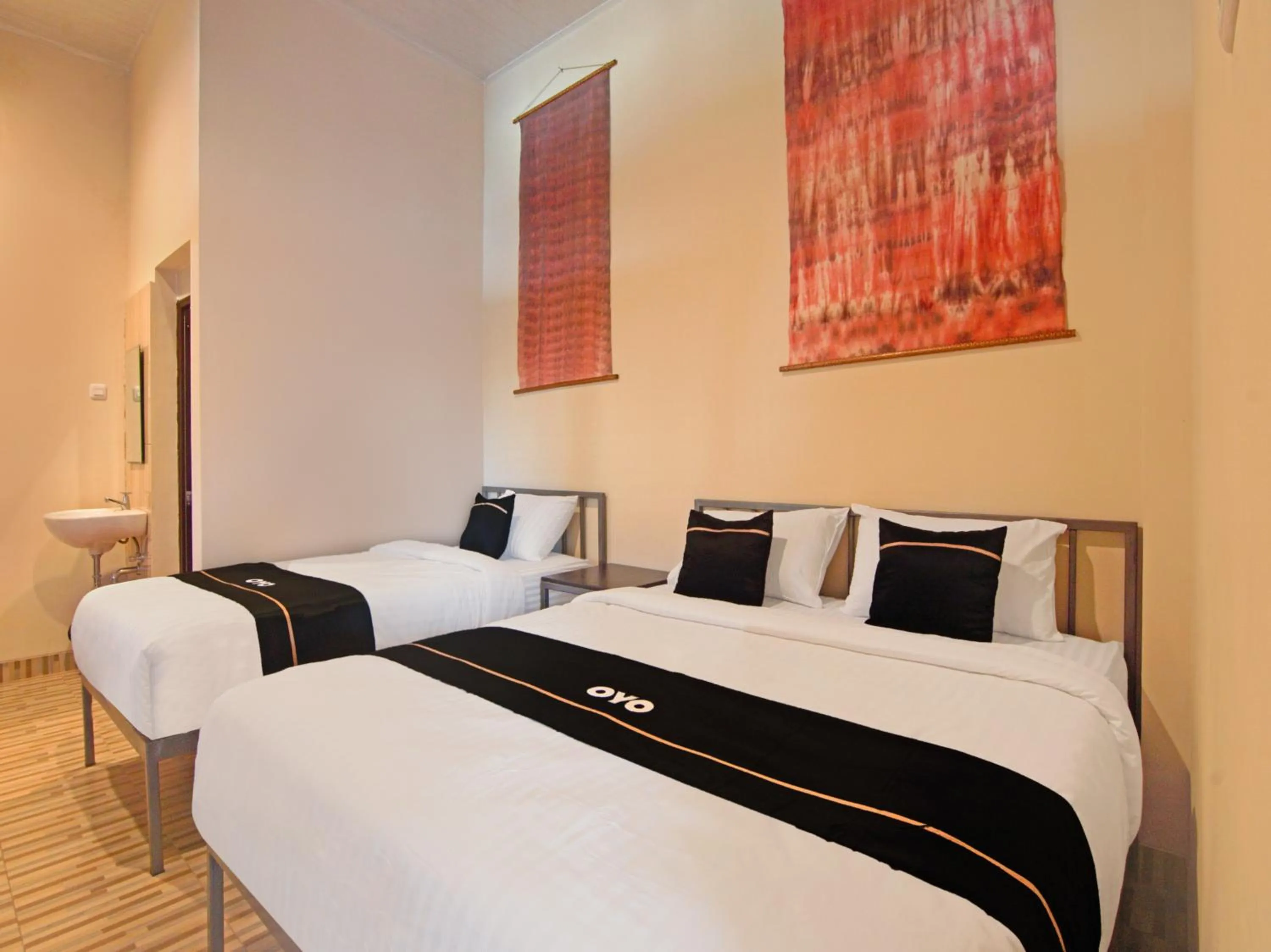 Bedroom in OYO 3606 Cendrawasih Resident