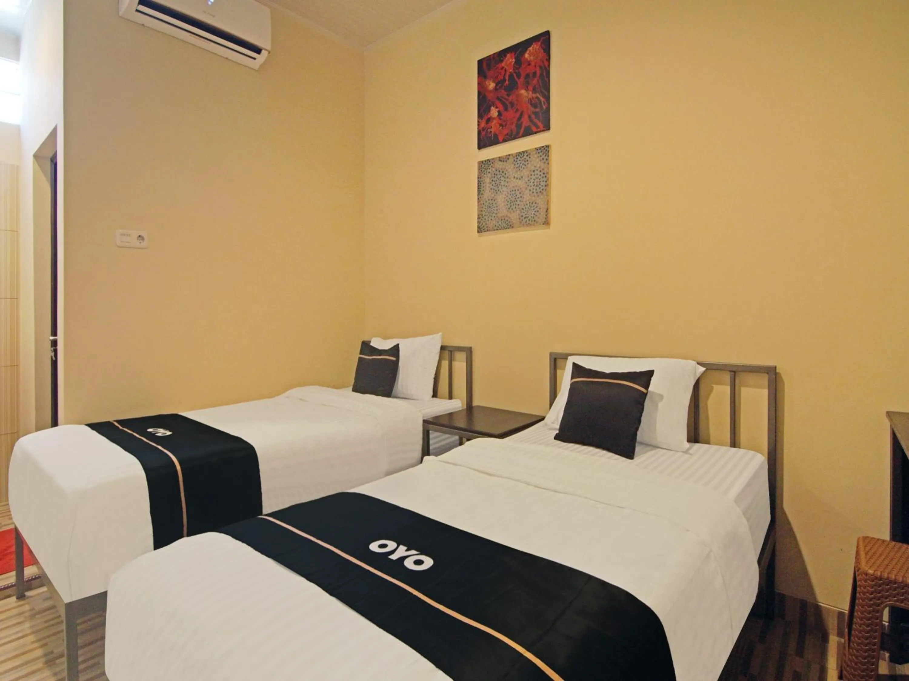 Bedroom in OYO 3606 Cendrawasih Resident